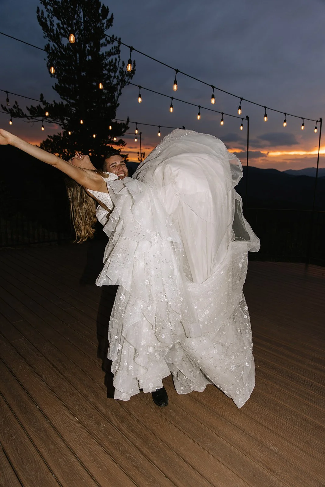 bride and groom at sunset
