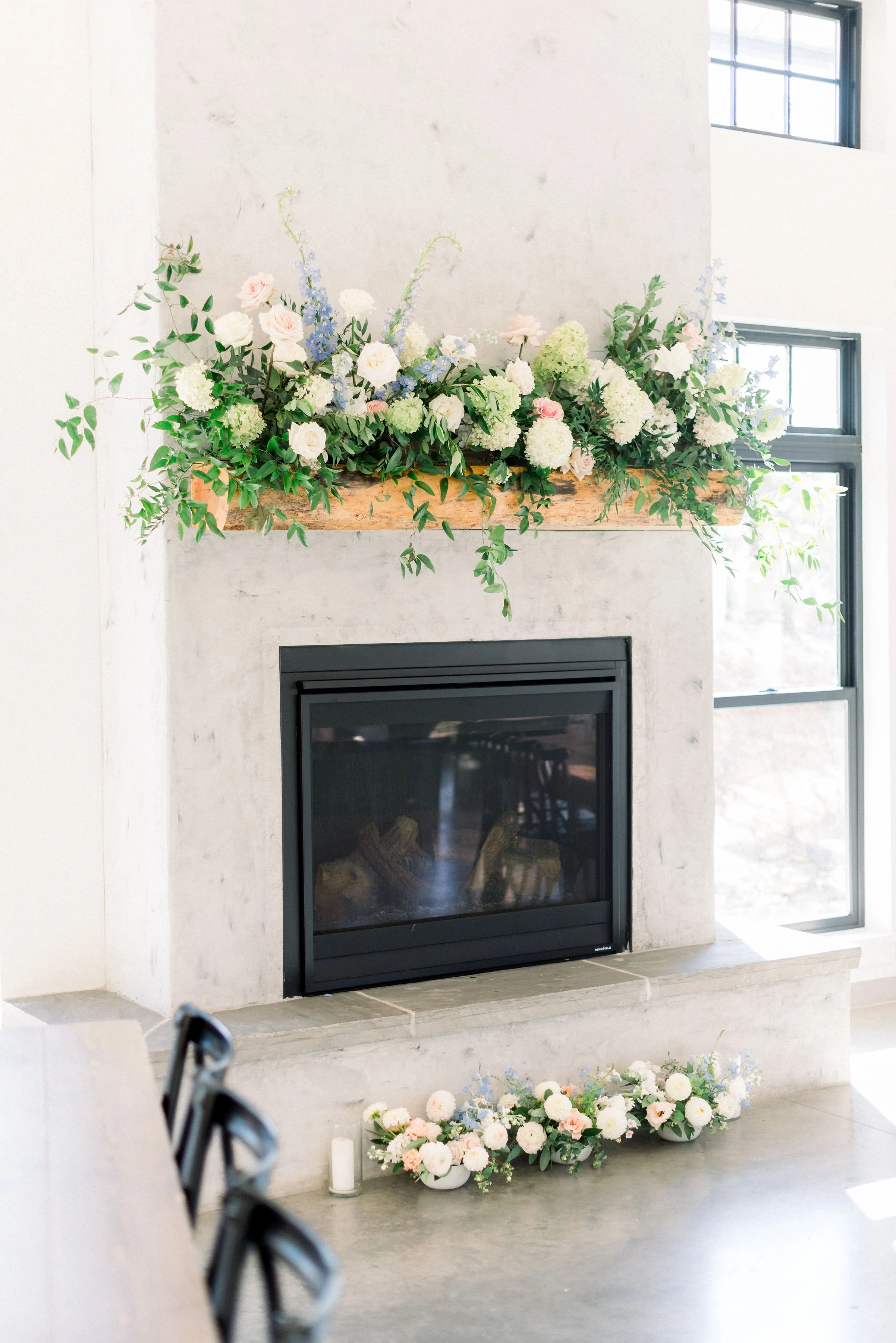 Fireplace mantle inspiration for behind a sweetheart table, or as a unique floral masterpiece.
