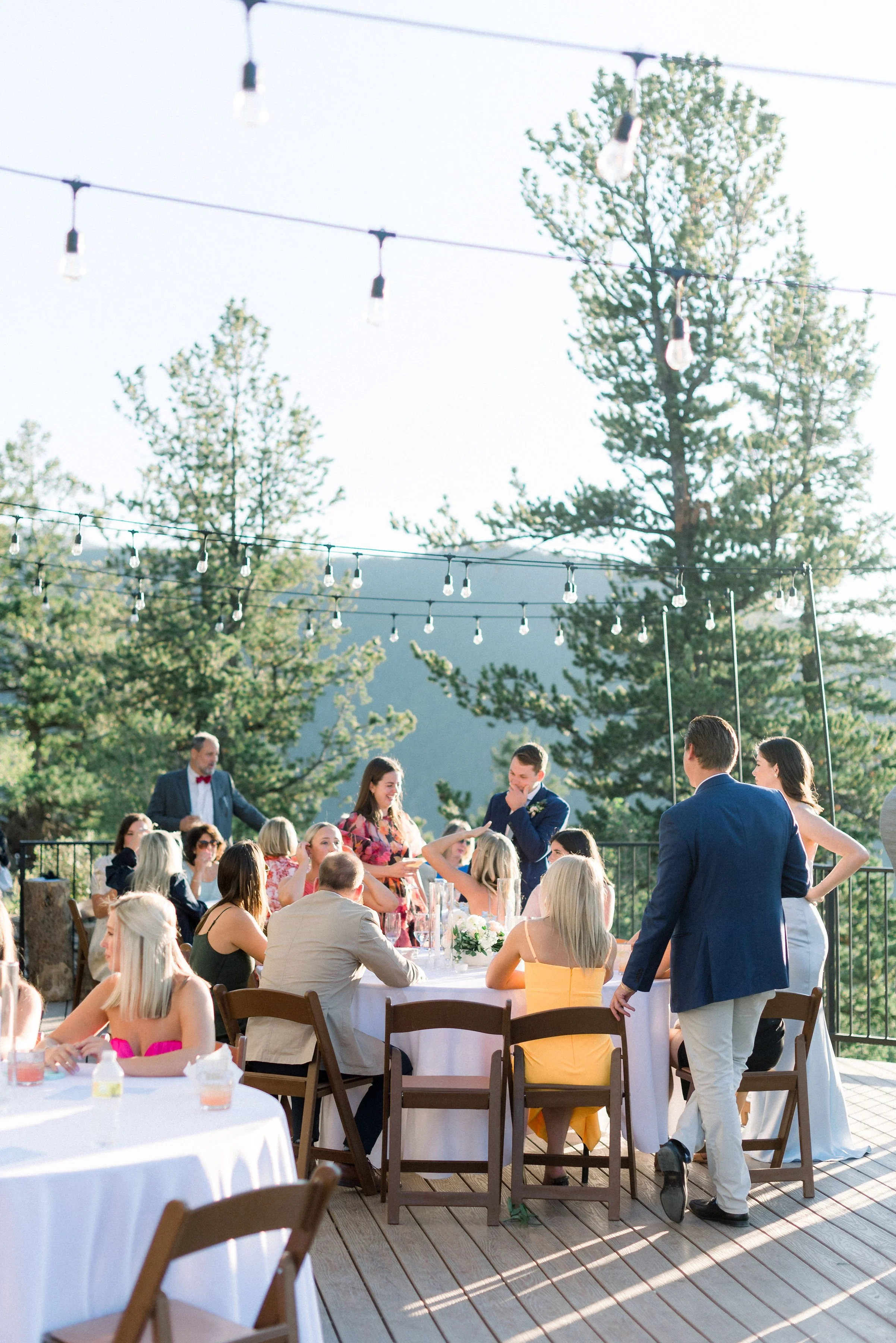 Unique wedding idea: have guests gather at round tables without assigned seating during cocktail hour to spur conversation and good vibes.