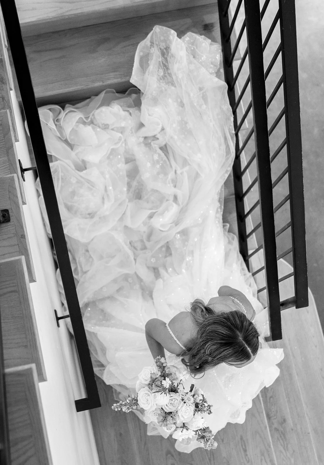 detail shots of a bride walking down the stairs