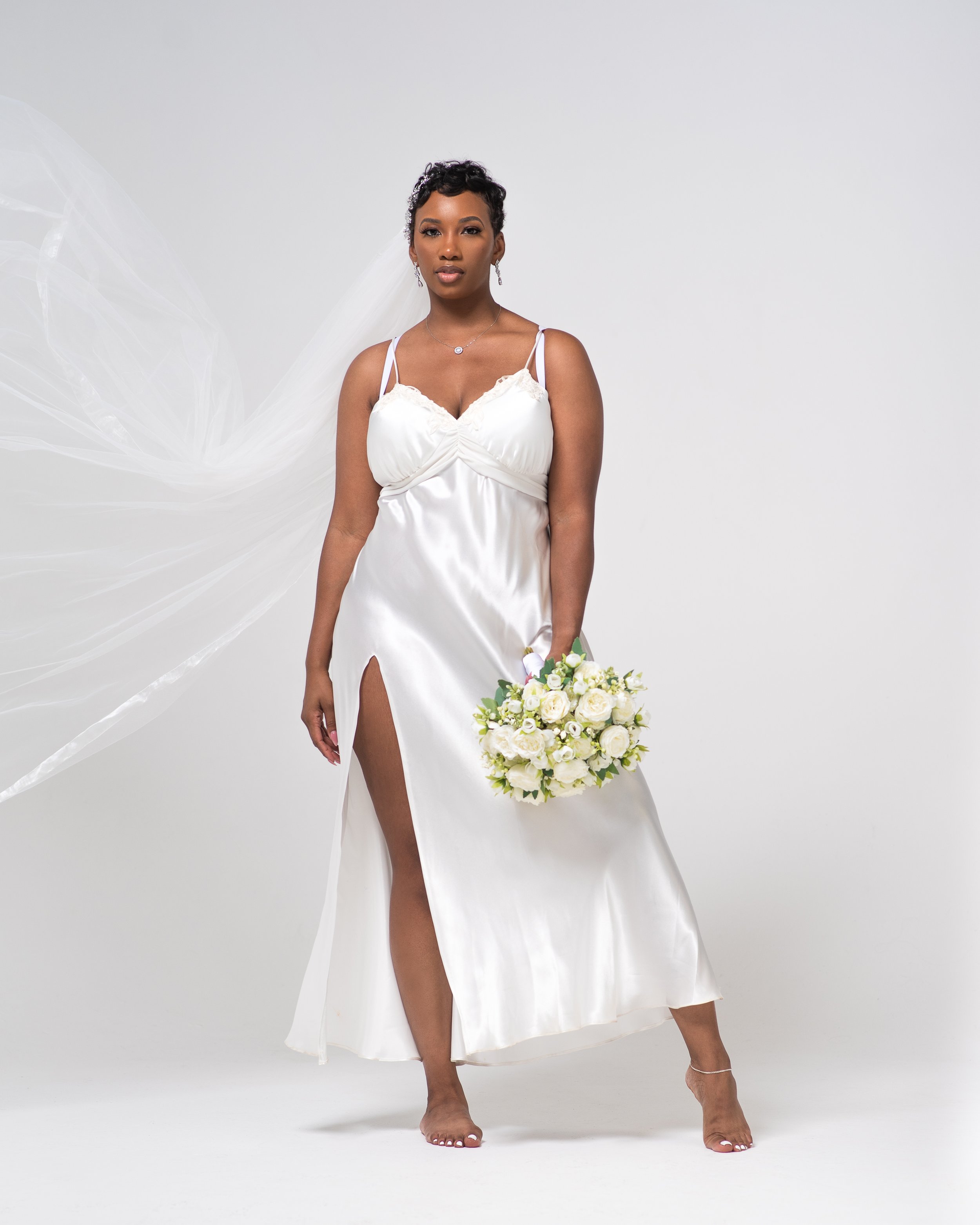 Dennis Gatz's expert use of lighting and composition brings out the beauty and elegance of a bride in his studio bridal shoot. The careful attention to detail and perfect poses create a timeless and unforgettable image.