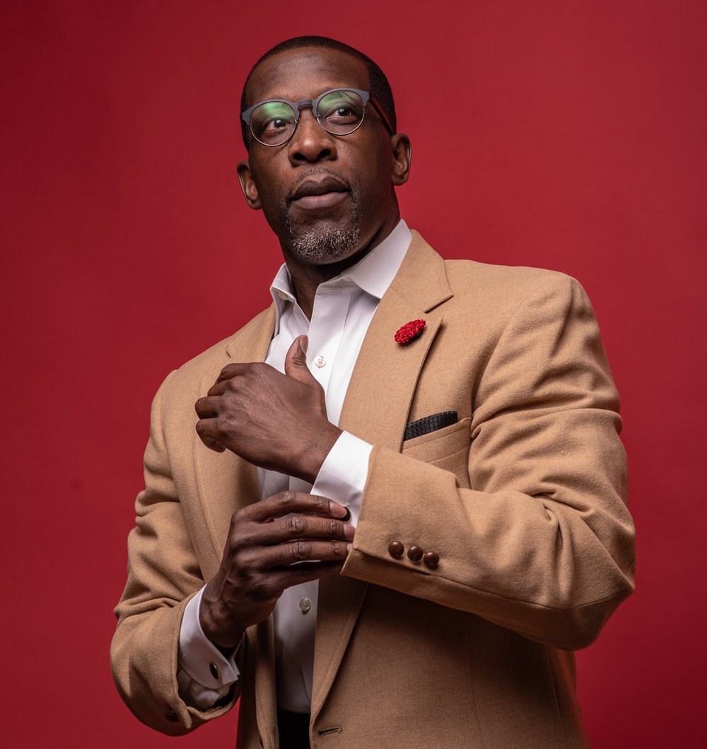 The art of portraiture: Dennis Gatz's stunning studio photograph of a male subject with rich and powerful hues