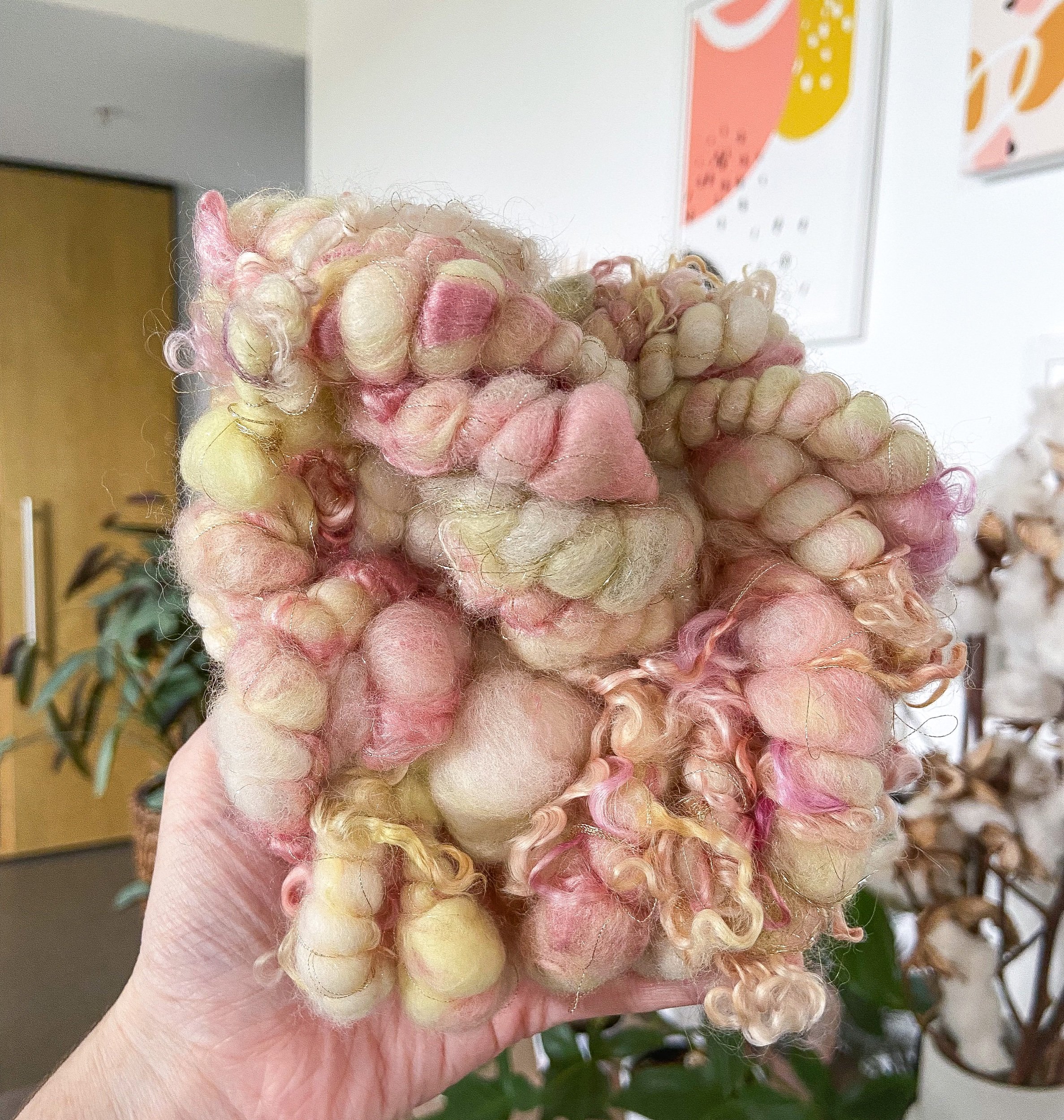 Pink and soft yellow handspun art yarn