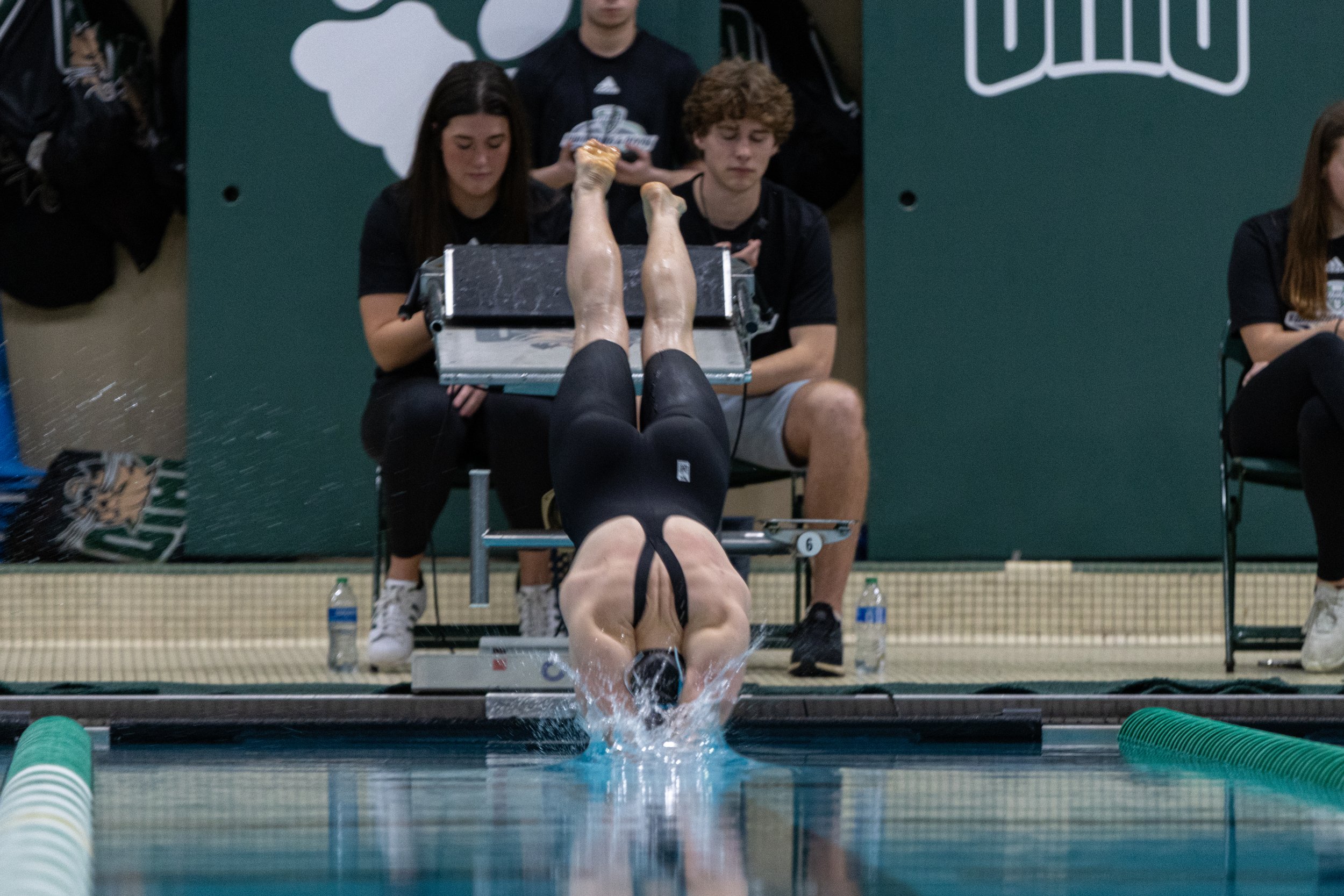 Ohio Bobcats swimmer Gabrielle McKee dives into the water for the 400 yard independent medley event in the MAC Swimming and Diving Championships in the Ohio University Aquatic Center in Athens, Ohio, Mar. 1, 2024. McKee placed fourth overall in the e