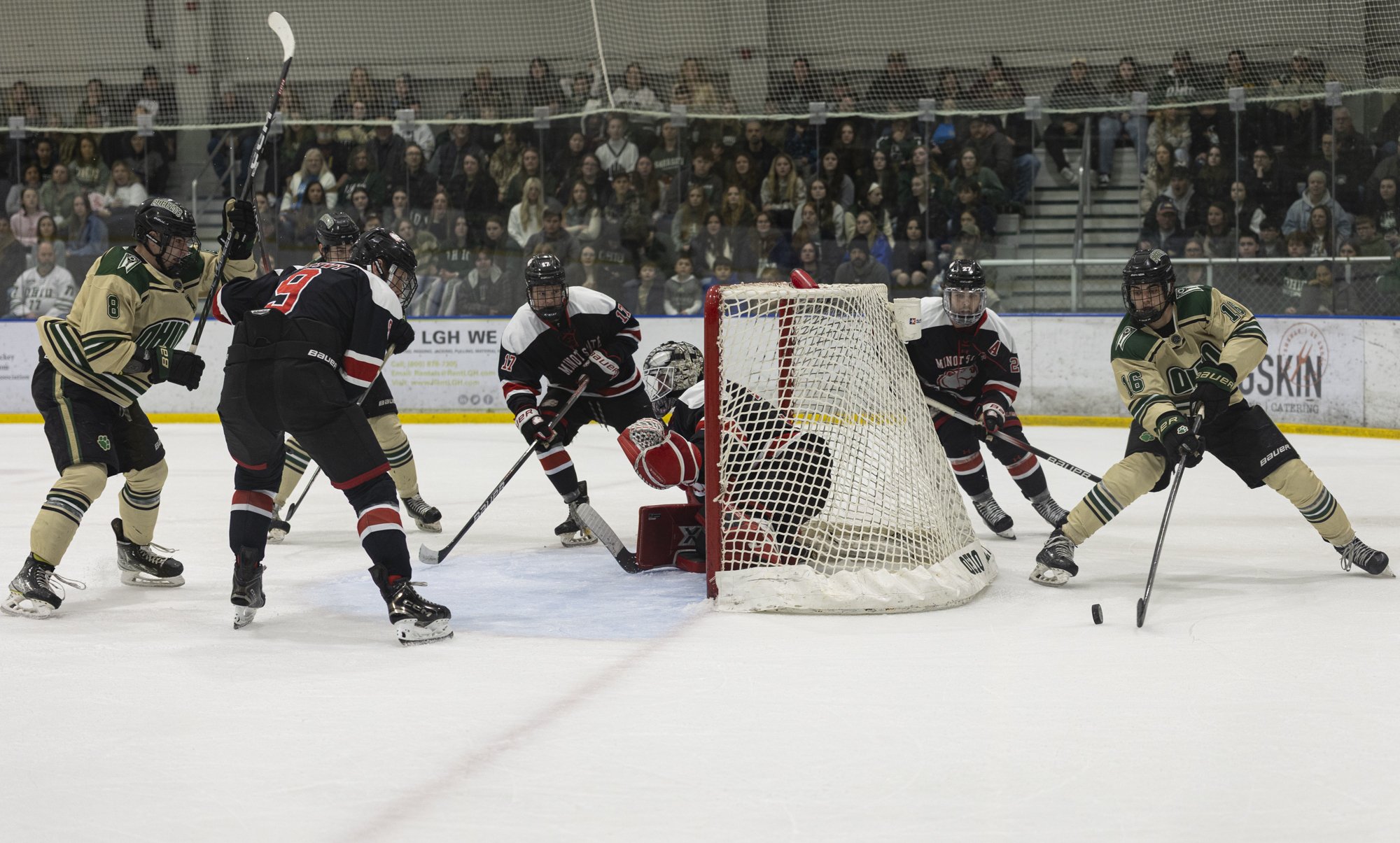 Ohio Bobcats defenseman Spencer Schons (16) wraps around the back of the net against Minot State at Bird Arena in Athens, Ohio, Feb. 15, 2025.