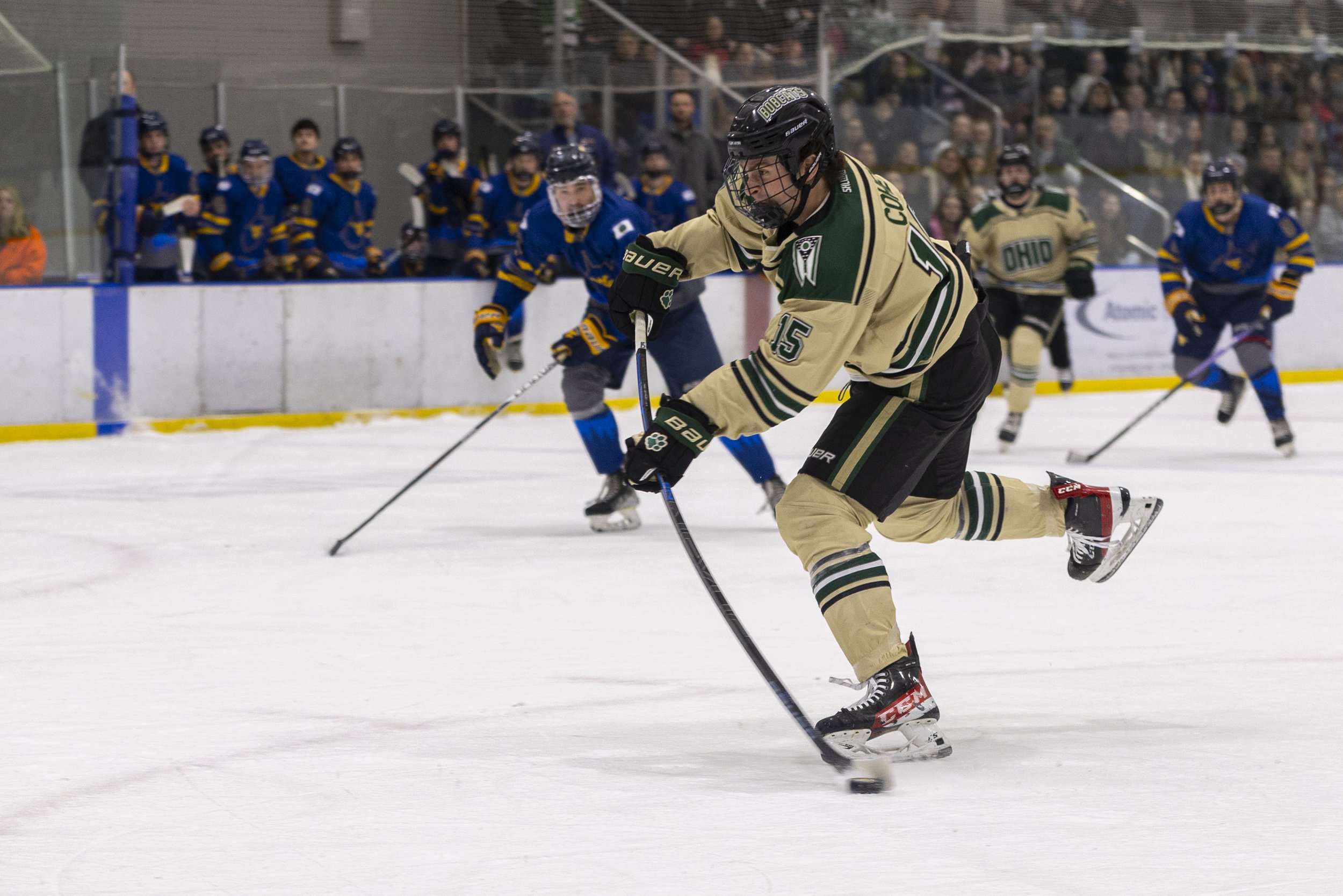 Ohio Bobcats forward Will Cohen (15) shoots the puck against West Virginia at Bird Arena in Athens, Jan. 18, 2025. The Bobcats swept the Mountaineers 9-0, winning both games of their weekend series.