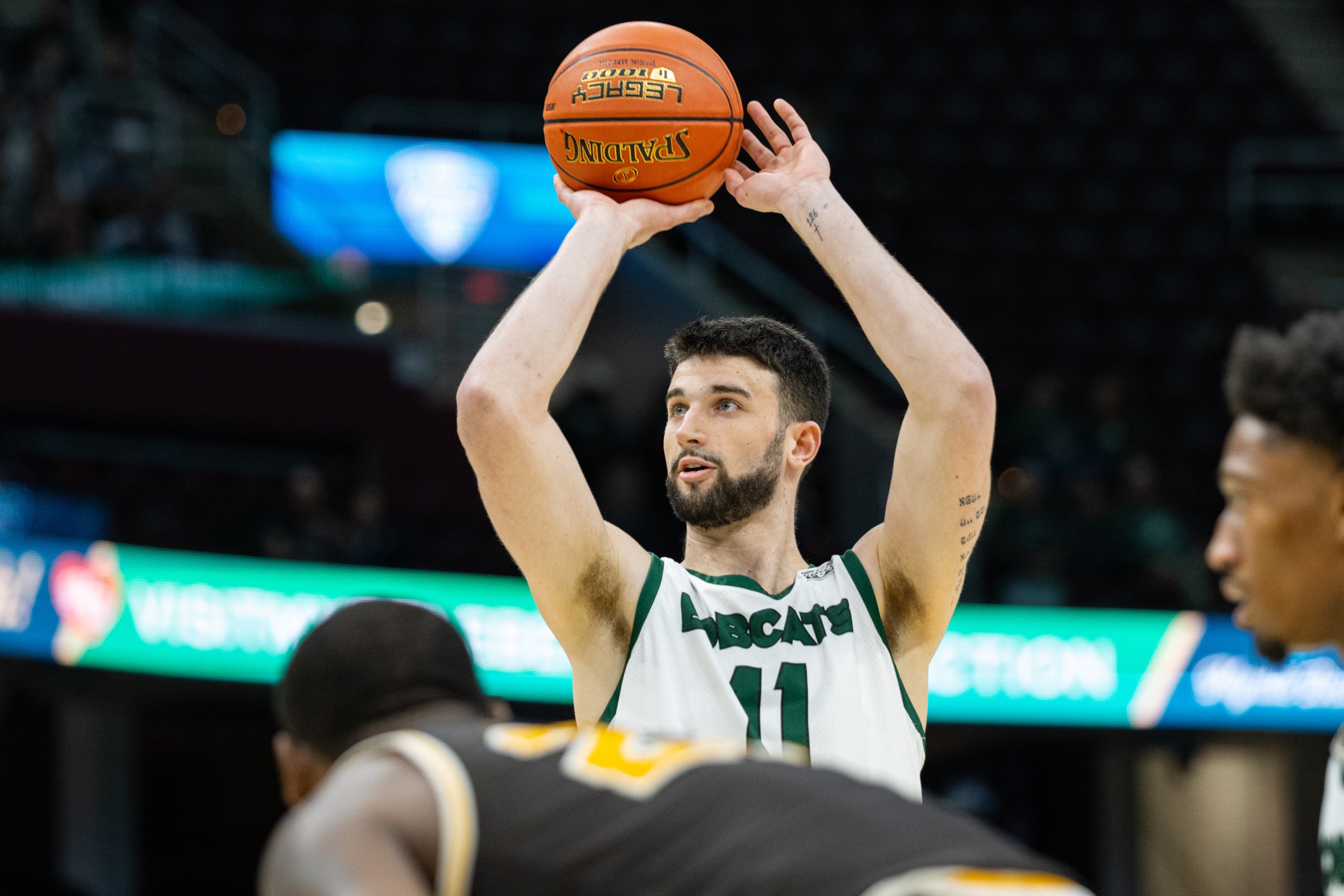 Ohio Bobcats center Gabe Wiznitzer (11) free throws against Western Michigan in the MAC Men's Basketball Tournament at Rocket Mortgage Fieldhouse in Cleveland, Ohio, Mar. 14, 2024. Wiziniter scored seven points, helping the Bobcats to a 82-55 victory