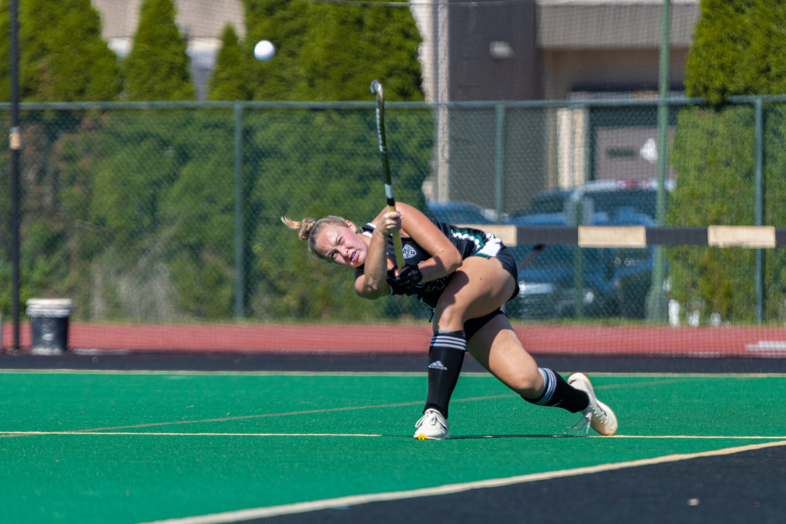 Ohio Bobcats back Emily Risser (16) hits the ball downfield against James Madison University at Pruitt Field in Athens, Oct. 4, 2024. | Shot for The Post