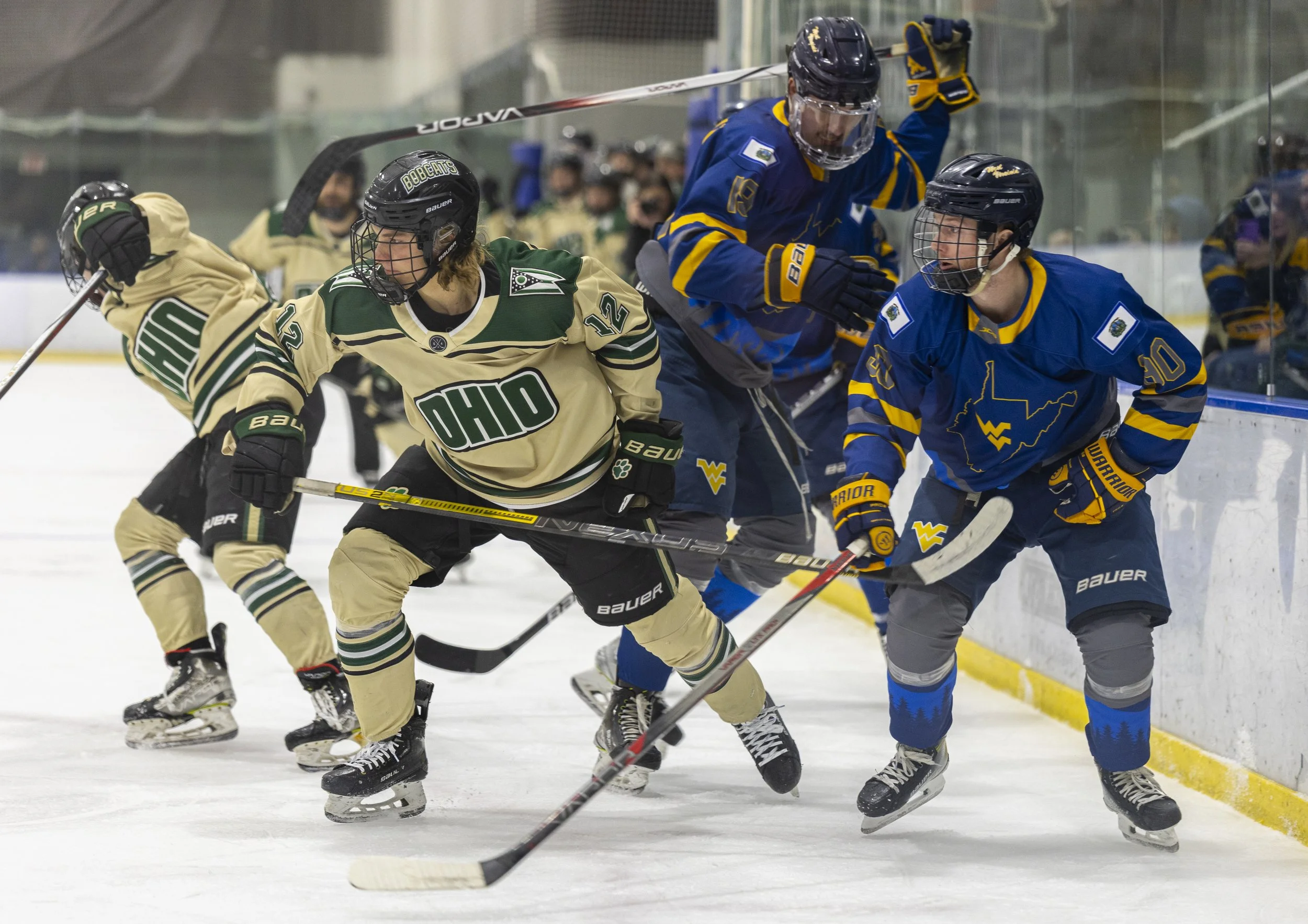 Ohio Bobcats forward Kevin Kasper (12) breaks off from a crowd of players against West Virginia at Bird Arena in Athens, Ohio, Jan. 17, 2025. | For The Post