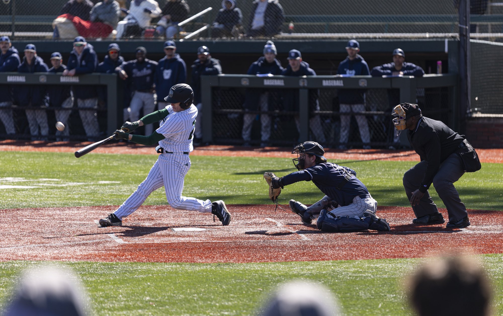 Ohio Bobcats catcher Jackson Cauthron (25) bats against Butler at Wren Stadium in Athens, Ohio, Mar. 2, 2025.