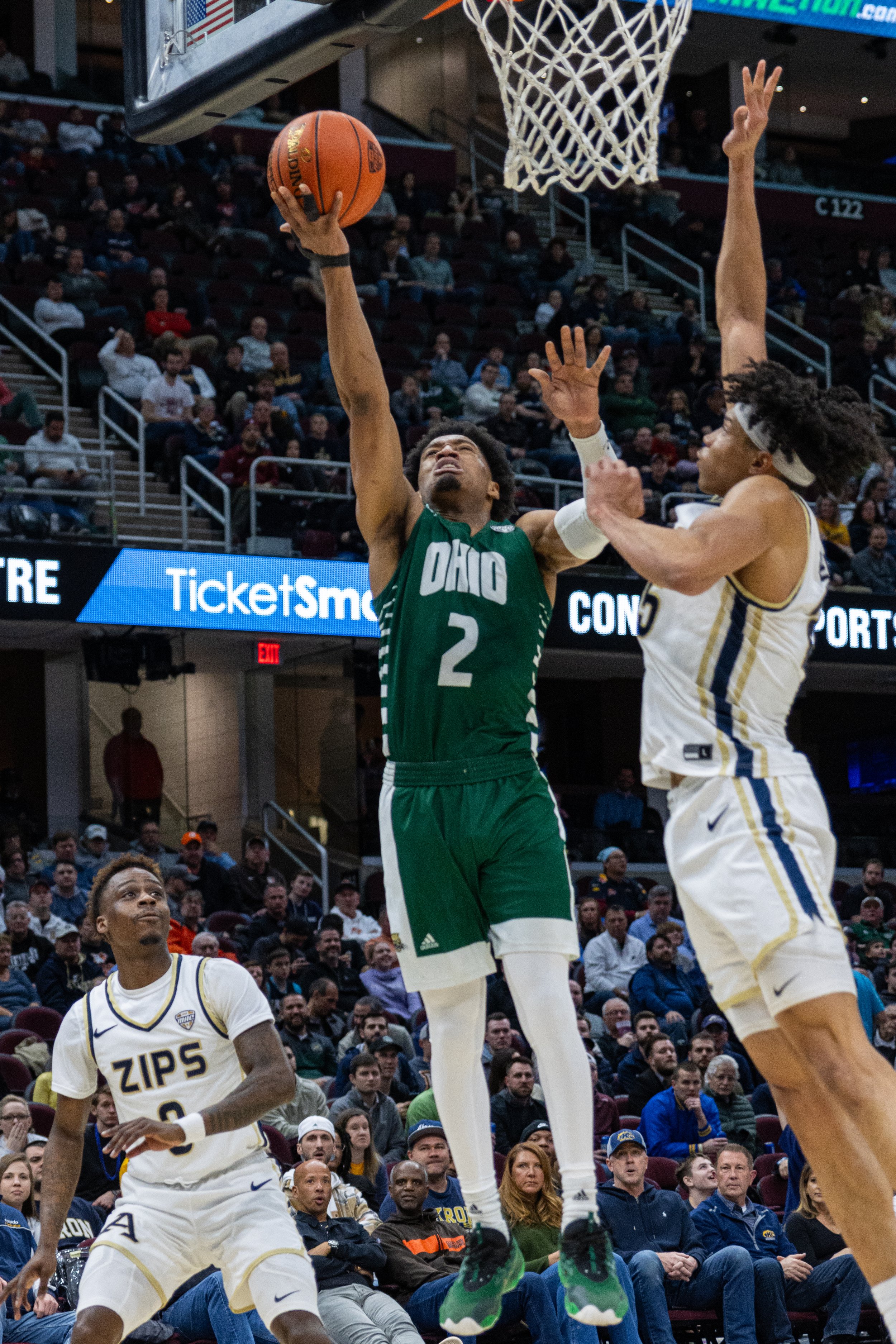 Ohio Bobcats guard Elmore James (2) goes for the net against Akron in the MAC Men's Bastketball Semifinals at Rocket Mortgage Fieldhouse in Cleveland, Ohio, Mar. 15, 2024. James scored 16 points for Ohio, but the Bobcats were beat by the Zips 65-62.