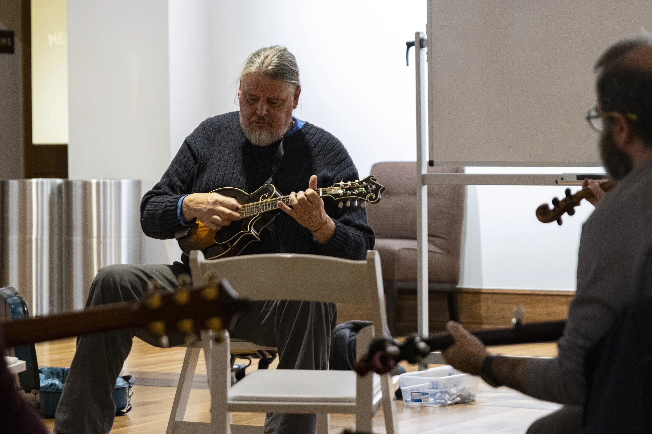 Zeke Hutchinson leads at the Old Time Jam Night at Stuart's Opera House in Nelsonville, Ohio, Jan. 16, 2025. | For The Post