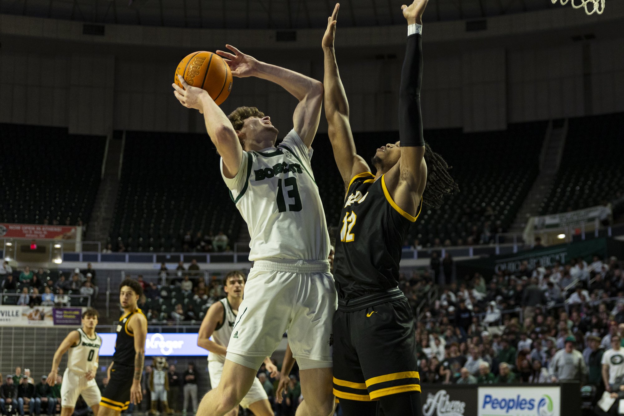 Ohio Bobcats guard Jackson Paveletzke (13) jumps for the net against Toledo in The Convo in Athens, Jan. 28, 2025.