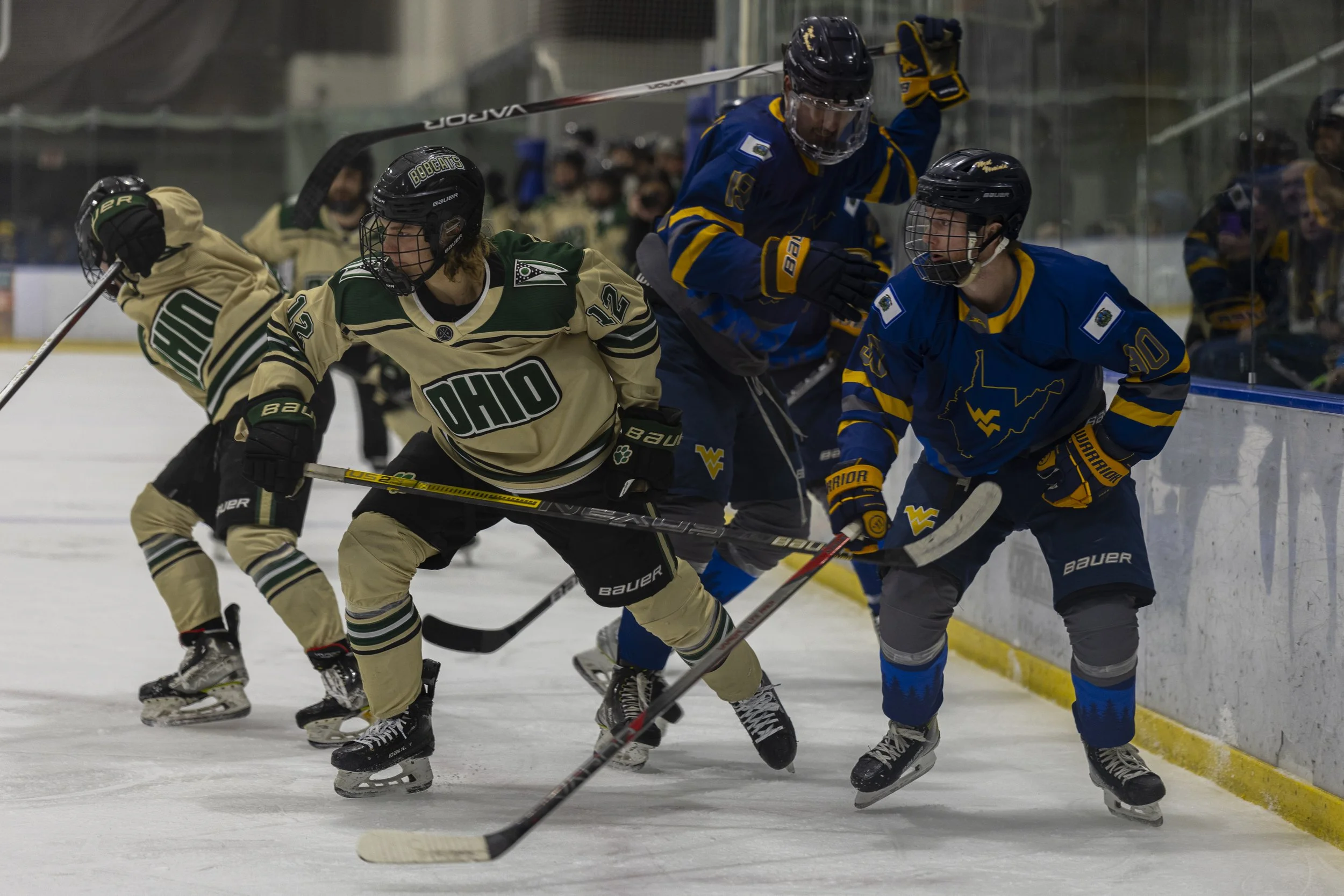 Ohio Bobcats forward Kevin Kasper (12) breaks off from a crowd of players against West Virginia at Bird Arena in Athens, Ohio, Jan. 17, 2025. | For The Post