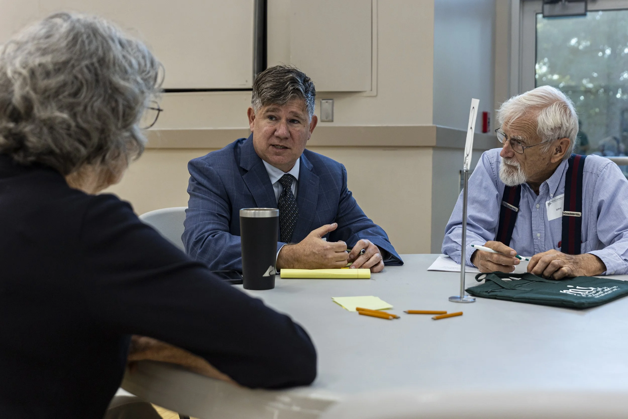 Democratic candidate for the Ohio House 95th district Paul Cameron talks with Athens area residents at a candidate roundtable hosted by the League of Women Voters at the Athens Community Center in Athens, Ohio, Sept. 29, 2026. | For The Post