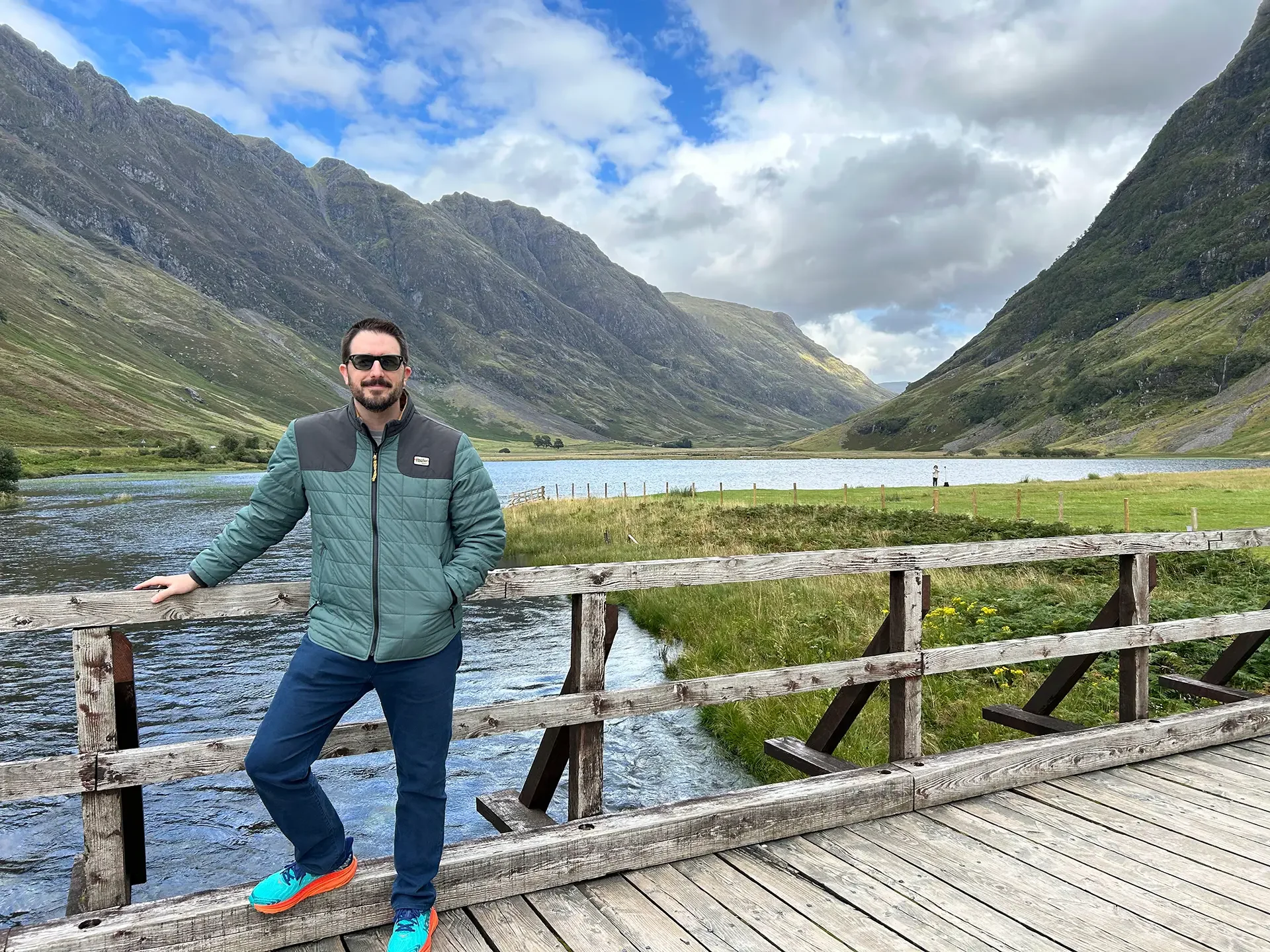 Kris Bicknell standing on a bridge in Scotland