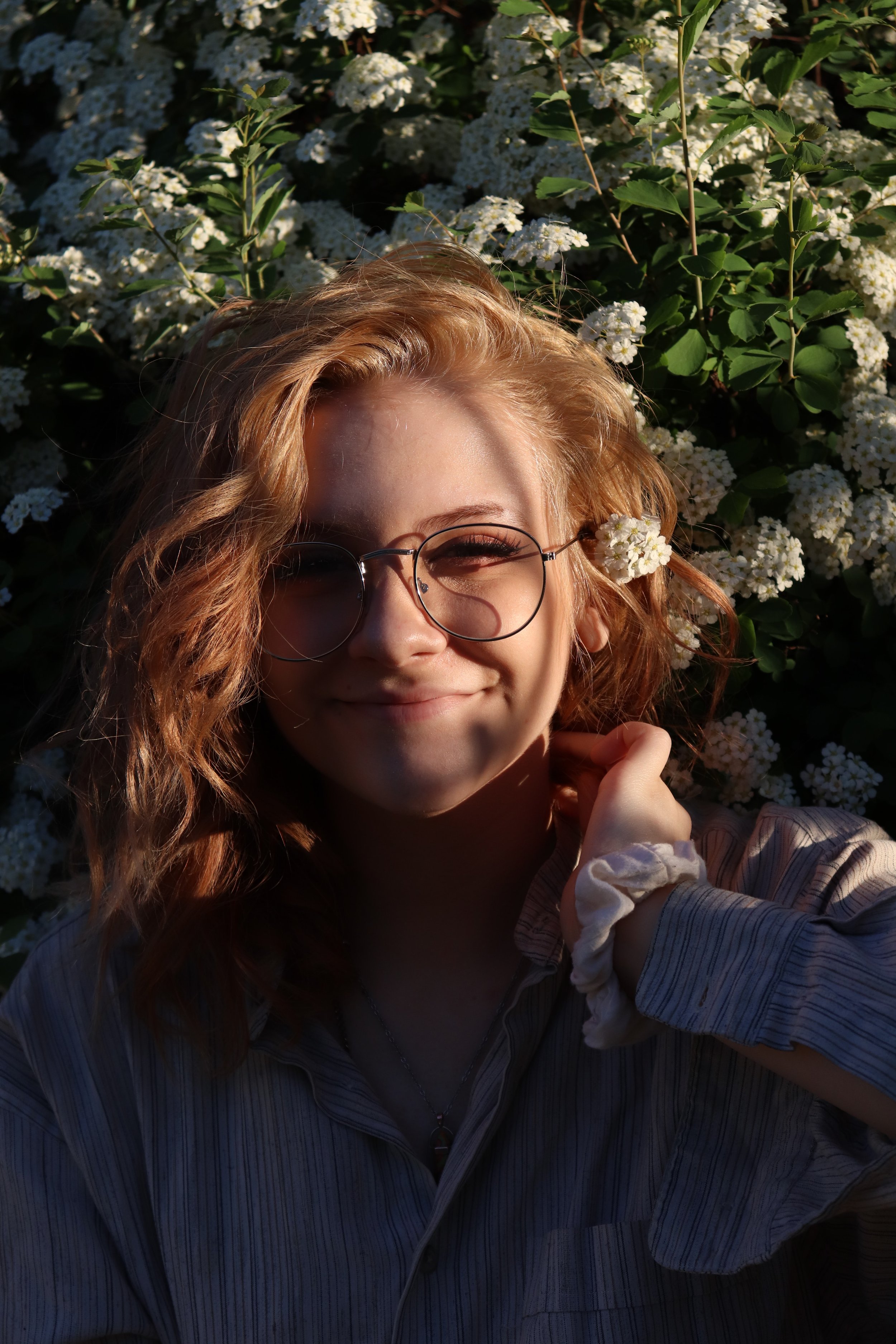 Woman smiling secure in her identity following therapy