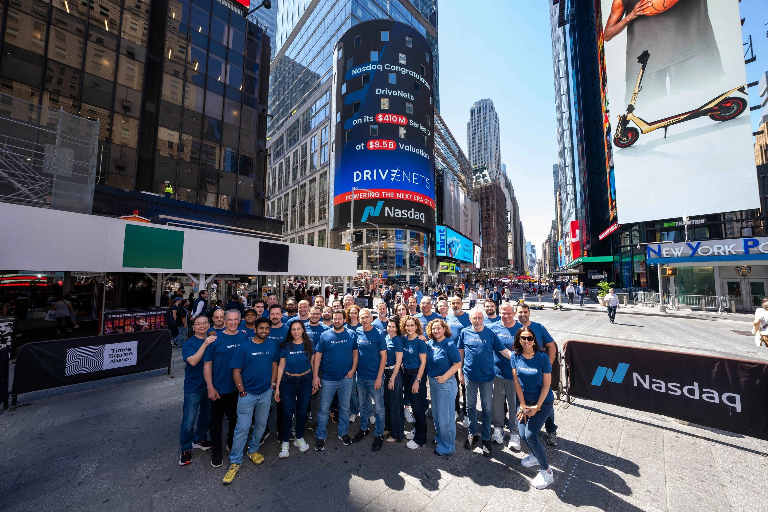 DriveNets Leadership in front of Nasdaq sign
