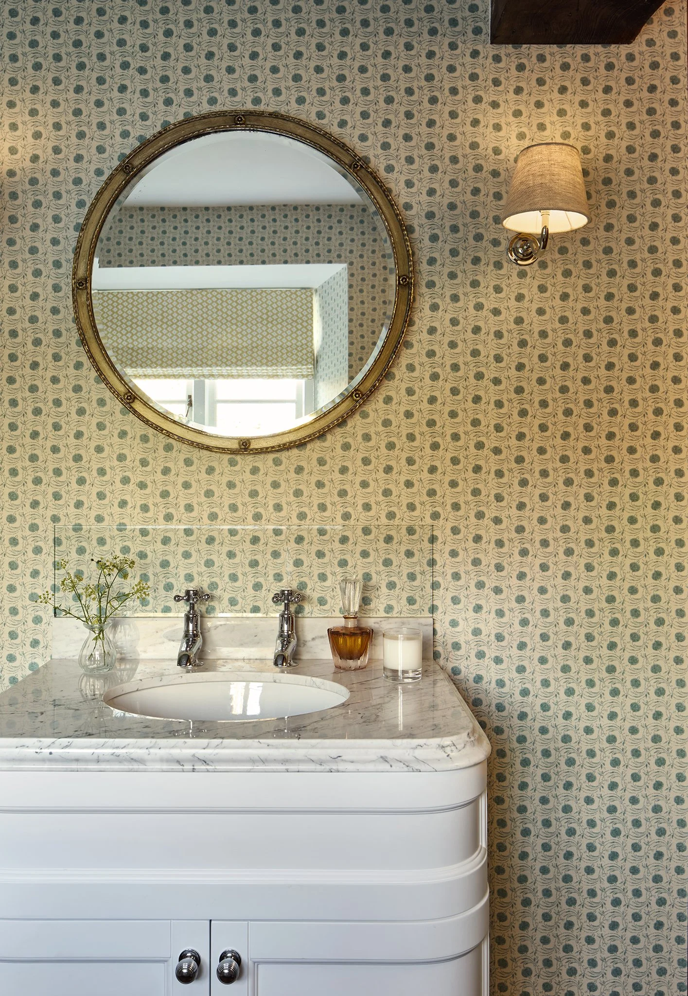 Bathroom vanity, bathroom wallpaper and round wall mirror