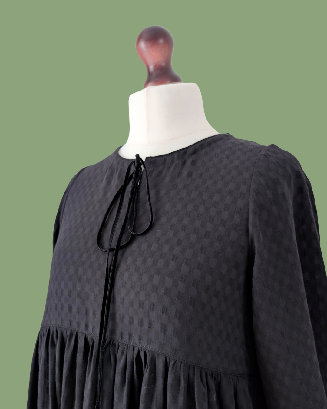 tuppence black midi dress.png