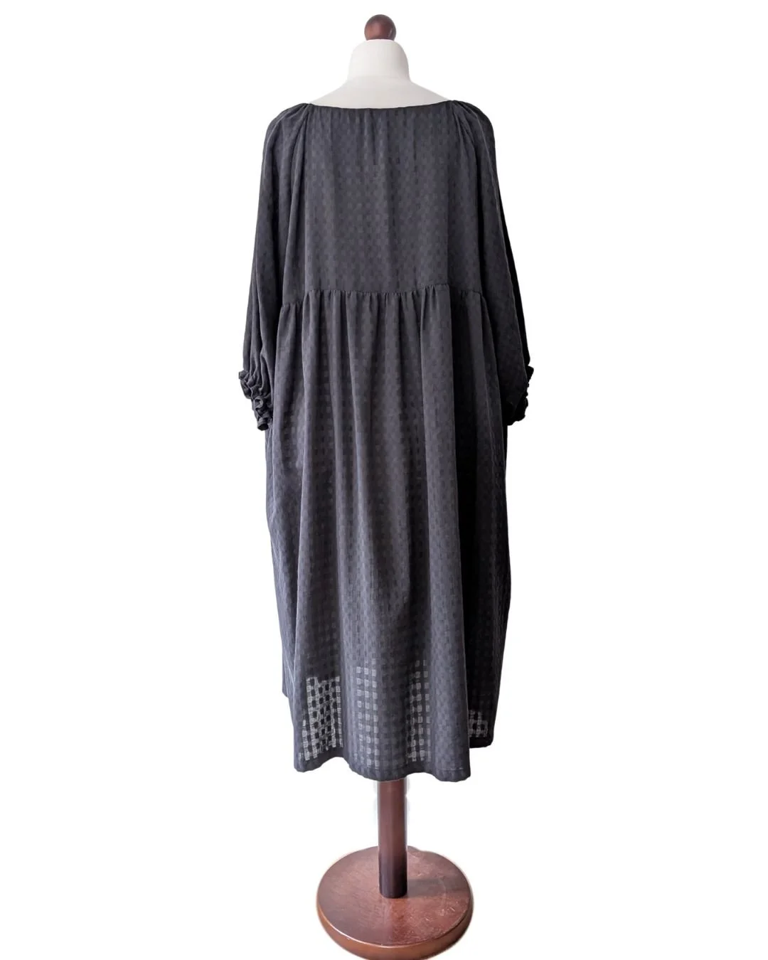 back of tuppence dress on tailors dummy