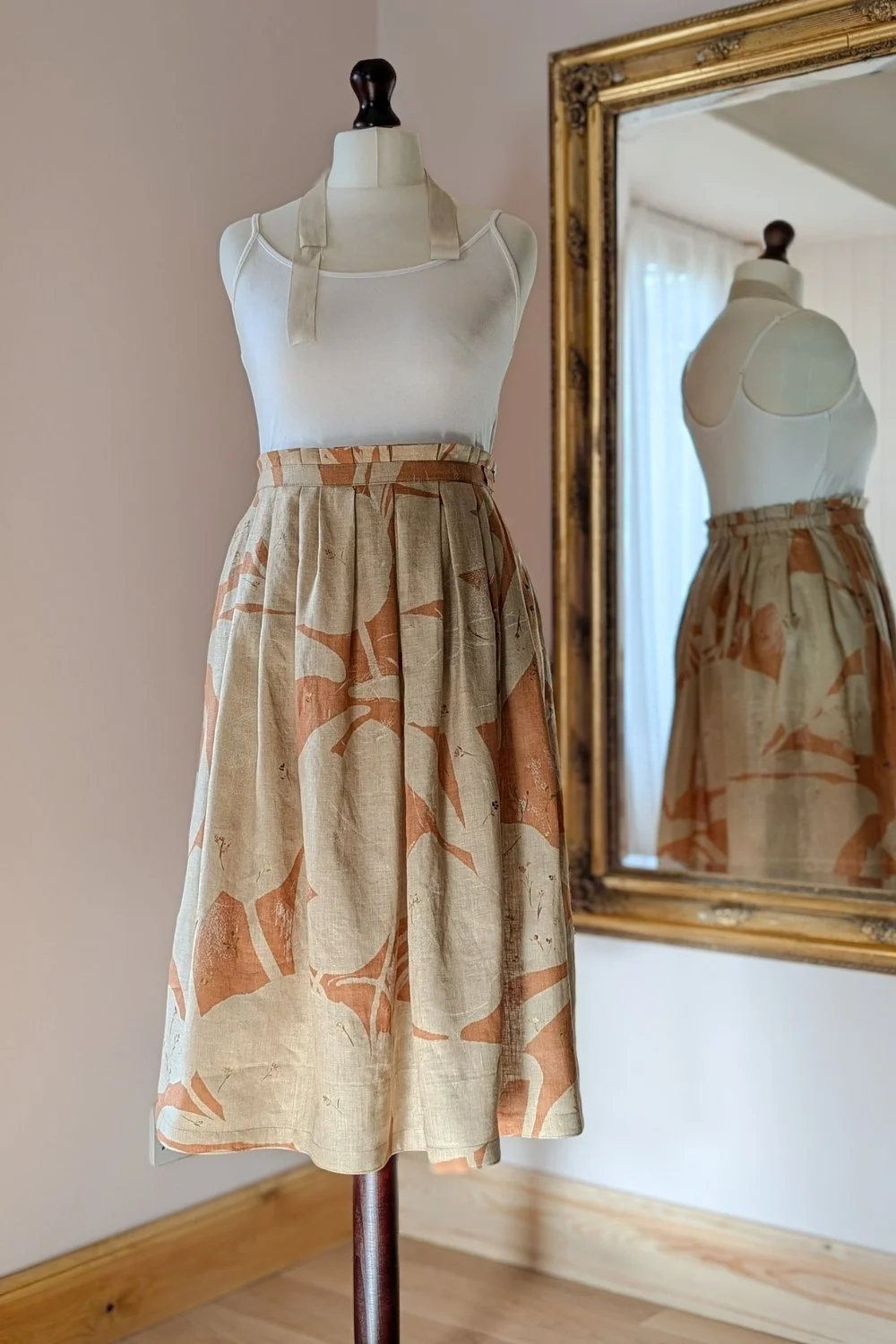 momo pleat skirt - peach - full length mannequin.jpg