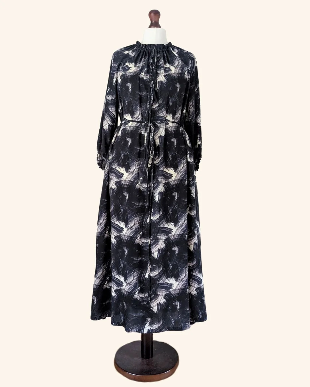 Marina black and white gathered neck maxi dress on a tailors dummy