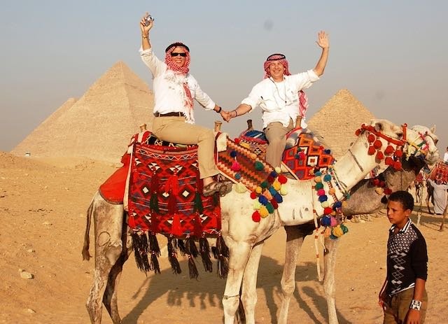 Egypt - Giza - Darla and Jerry on camels.jpeg