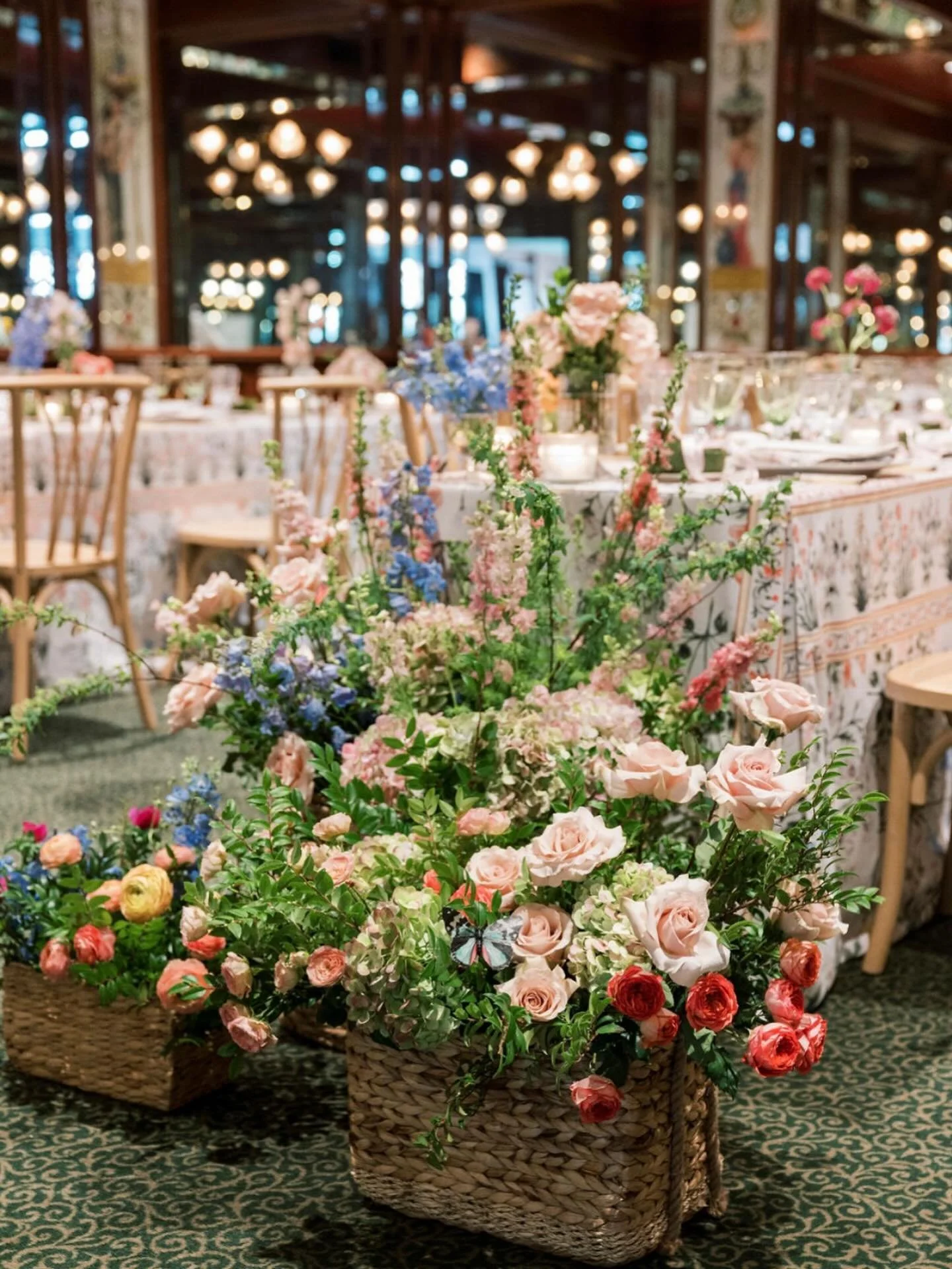 We brought the garden in.
Woven baskets bursting with springtime blooms softened the room and anchored our story &mdash; freeform, romantic, a little playful.

Not just florals, but floral intention. @sweetmemoriesflowers 

#luxuryevents #gardenparty