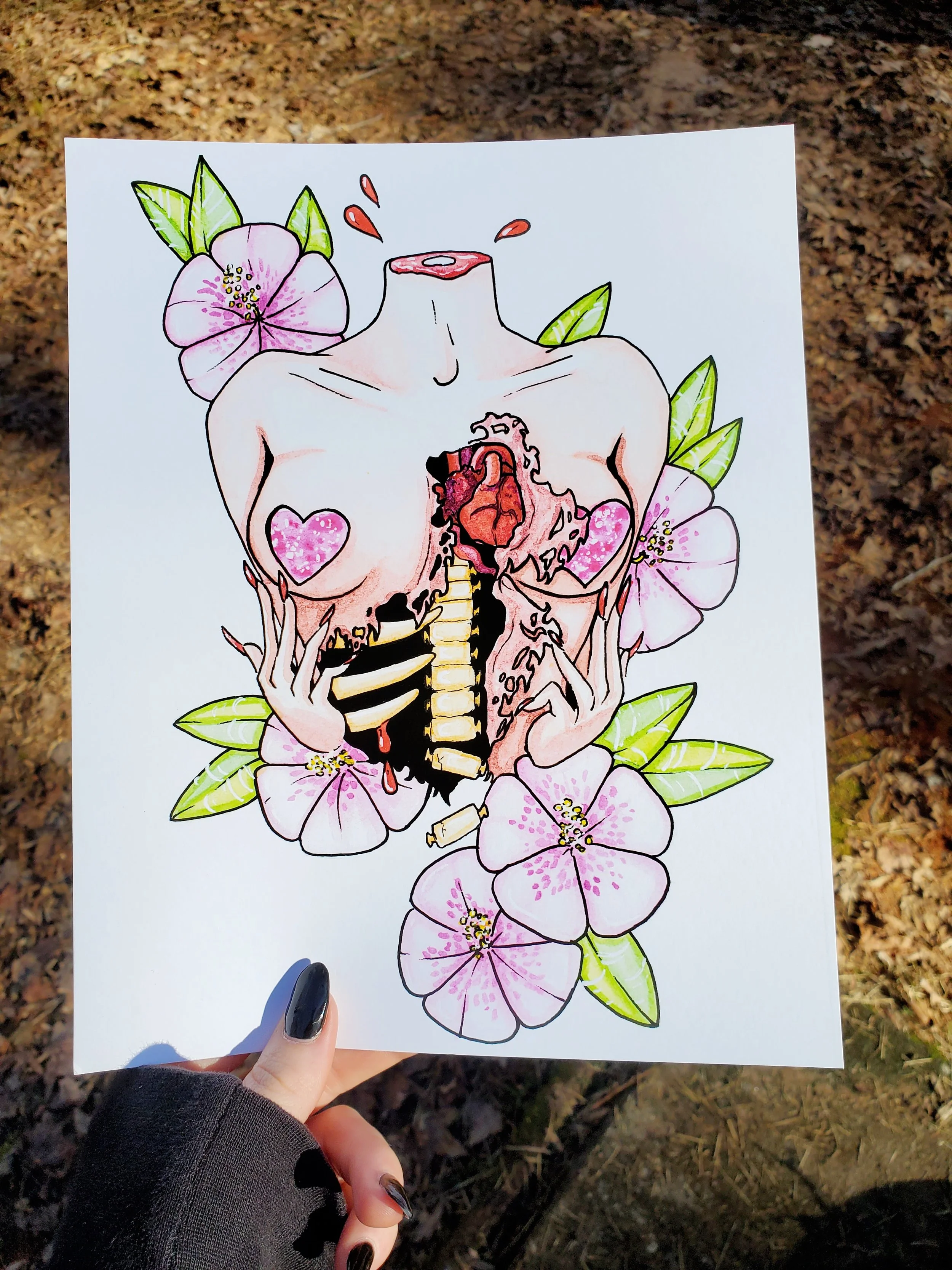 Artwork of a decayed, headless female figure with pink flowers and green leaves surrounding it, with internal organs depicting a skull and ribs. The figure appears to be in a gothic, surreal style.