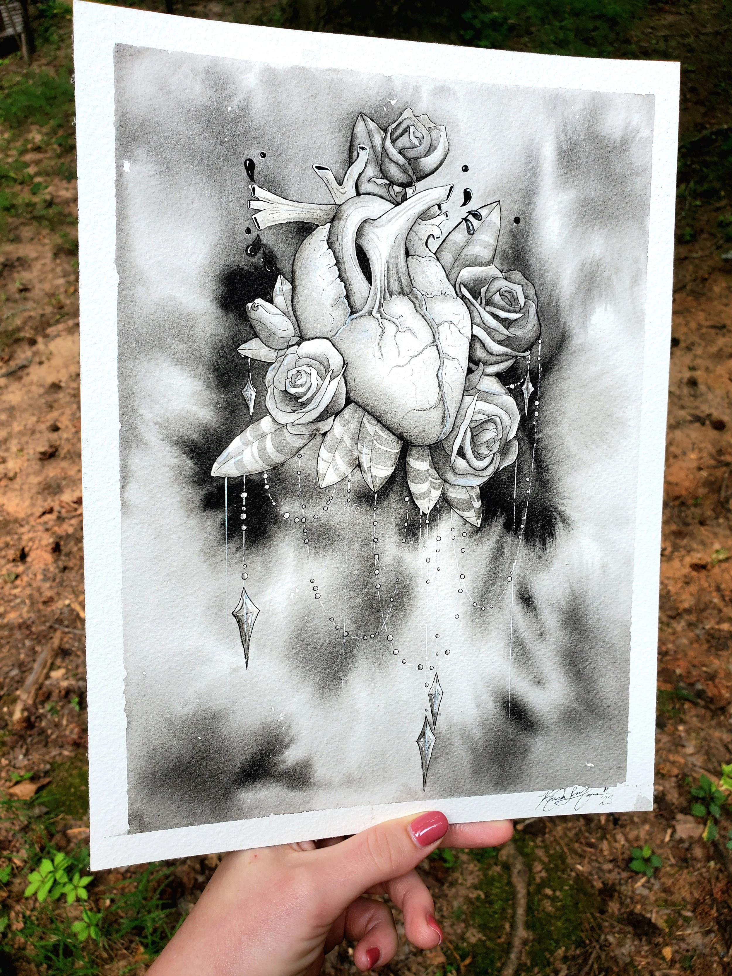 A black and white watercolor painting of a human heart surrounded by roses, leaves, and hanging diamond-shaped decorations.