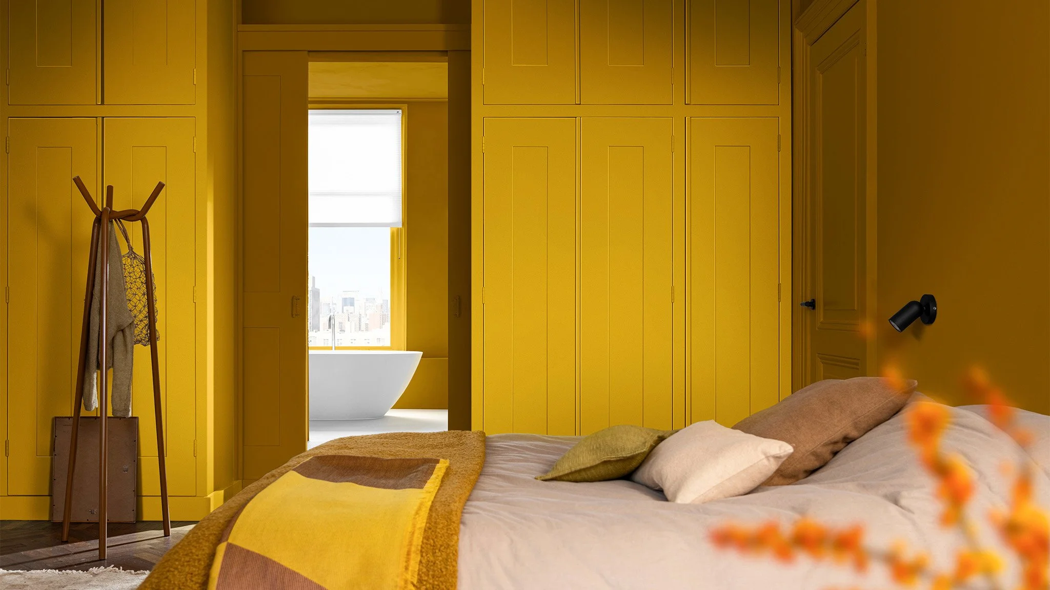 Yellow bedroom with yellow wardrobes painted in Dulux True Joy