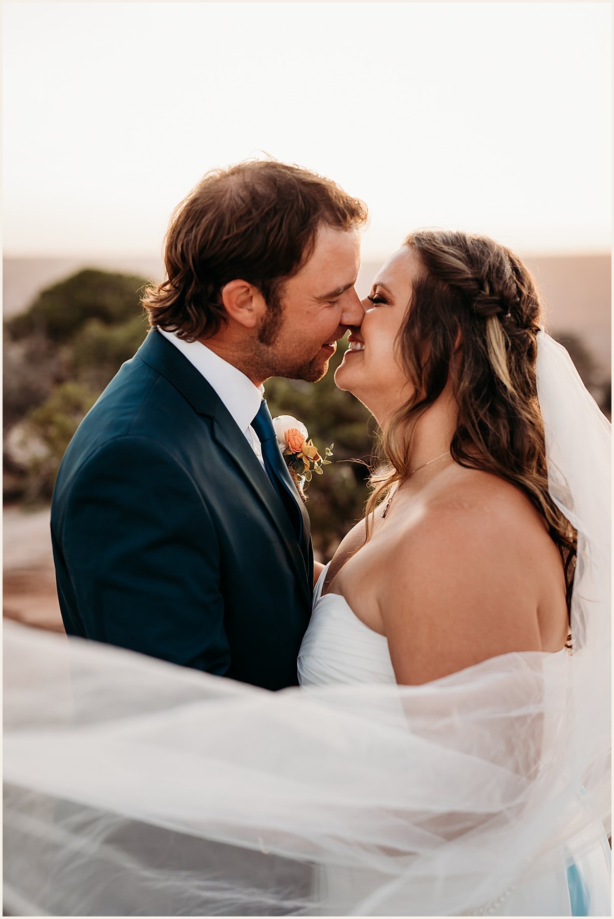 Bride and groom wedding portraits on mountain with veil | Lauren Crumpler Photography | Elopement Wedding Photographer