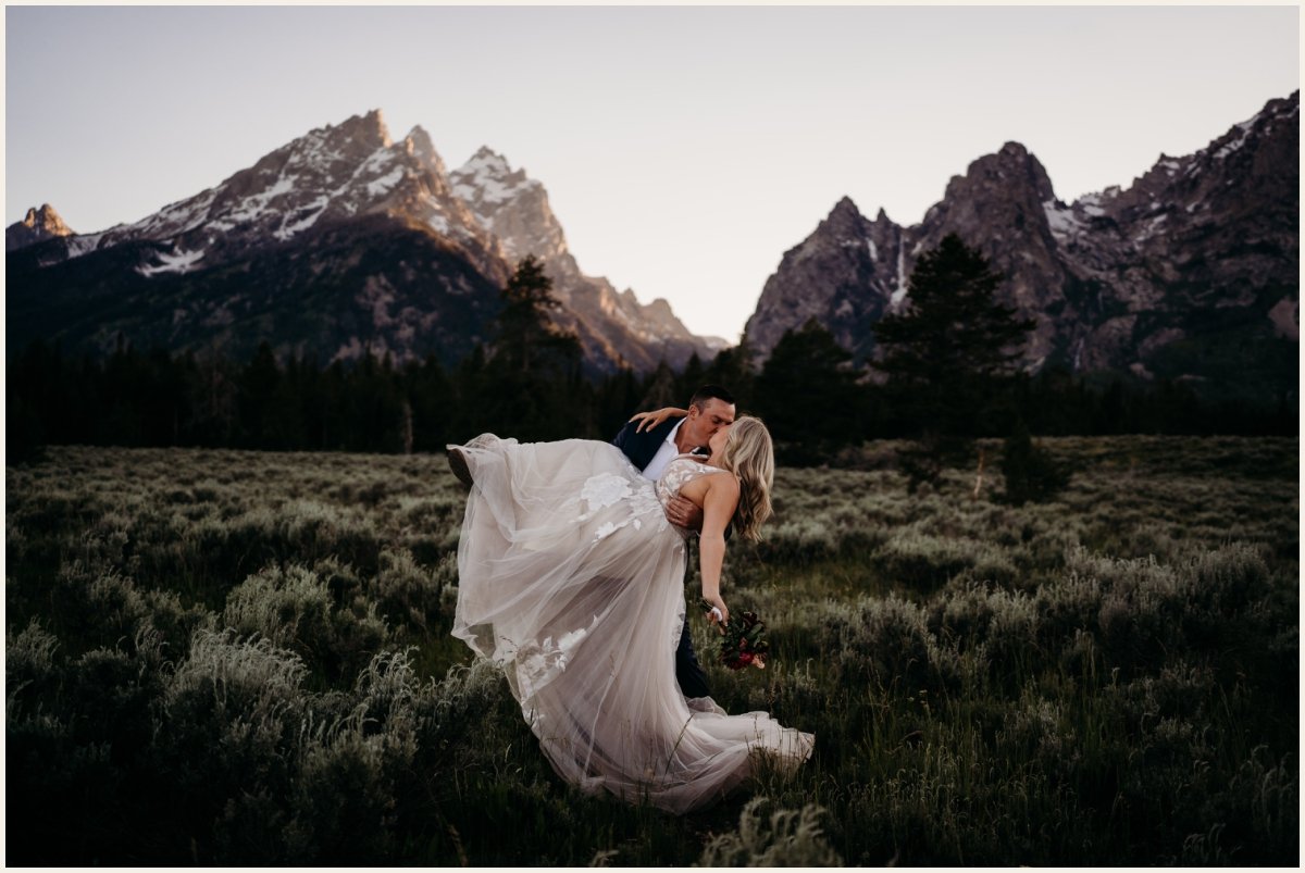 Bride and Groom kissing in the Wyoming Mountains at the Antelope Flats | Lauren Crumpler Photography | Elopement Wedding Photographer