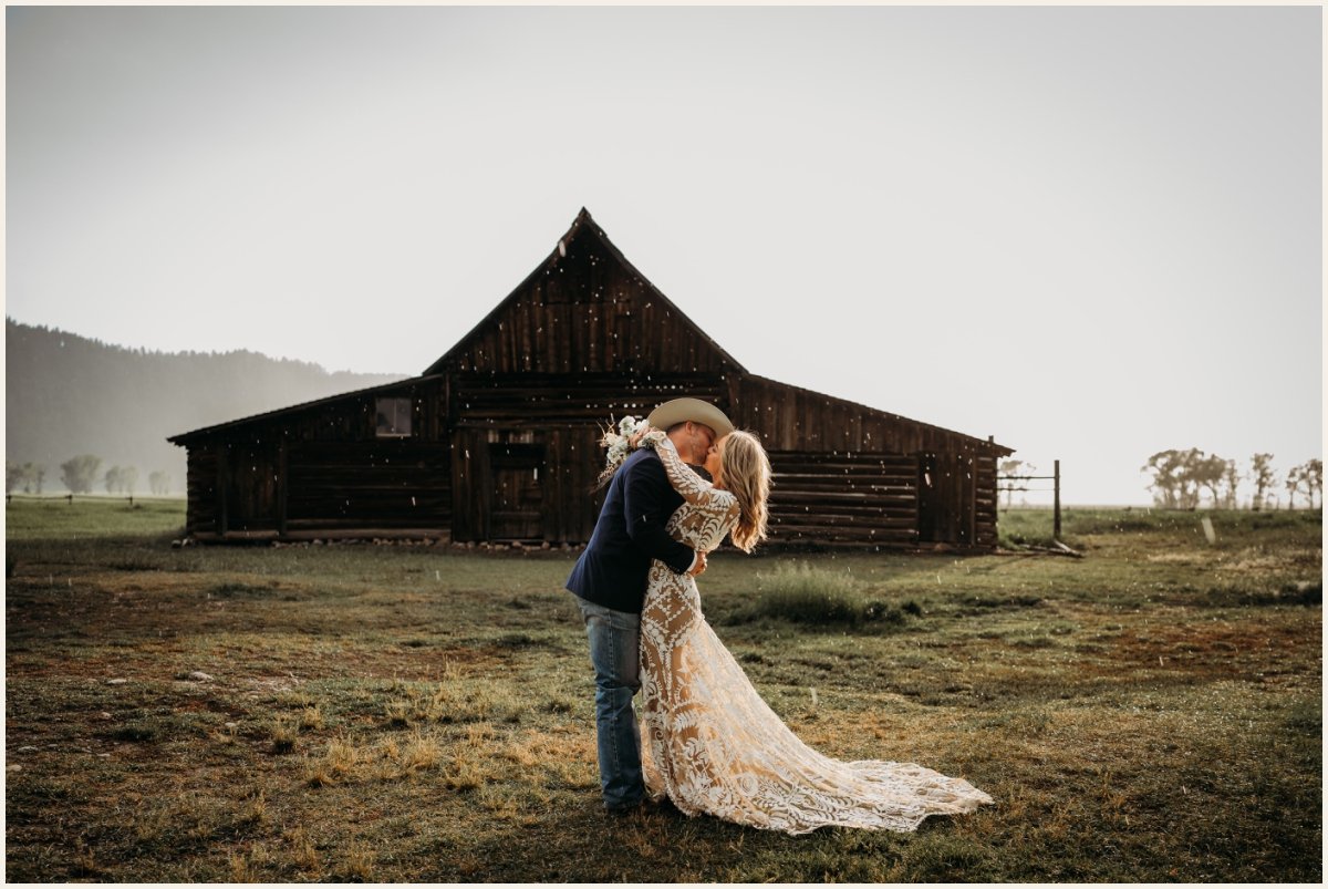 Bride and Groom kissing in the rain at Grand Teton National Park | Lauren Crumpler Photography | Elopement Wedding Photographer