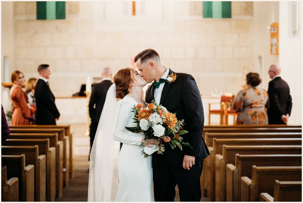 Bride and groom first kiss married | Lauren Crumpler Photography | Texas Wedding Photographer