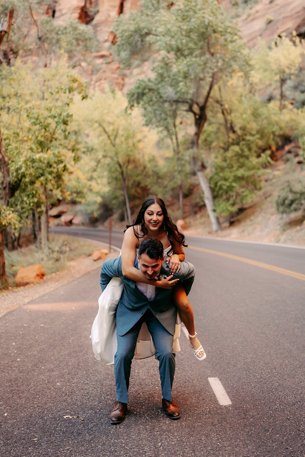  Bride and Groom being funny during their photoshoot 