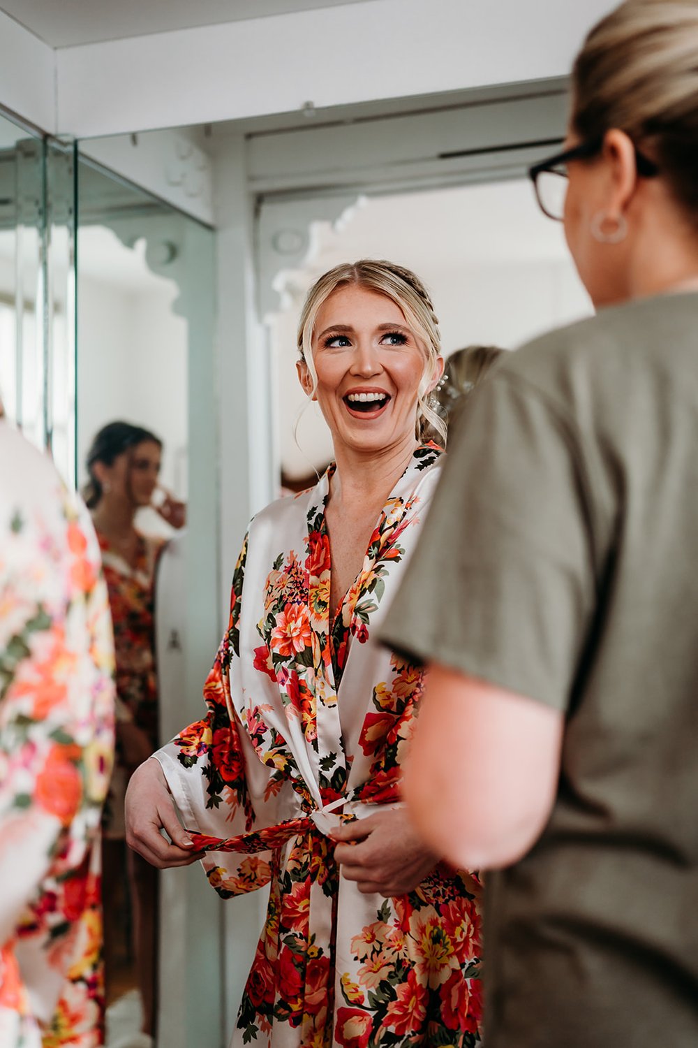  Bride excited during her getting ready process 