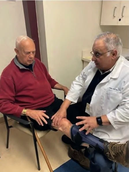 A check-up visit with Dr. John Aseffat the National Rehabilitation Hospital's Post-Polio Clinic, 2022. (Courtesy of NRH)