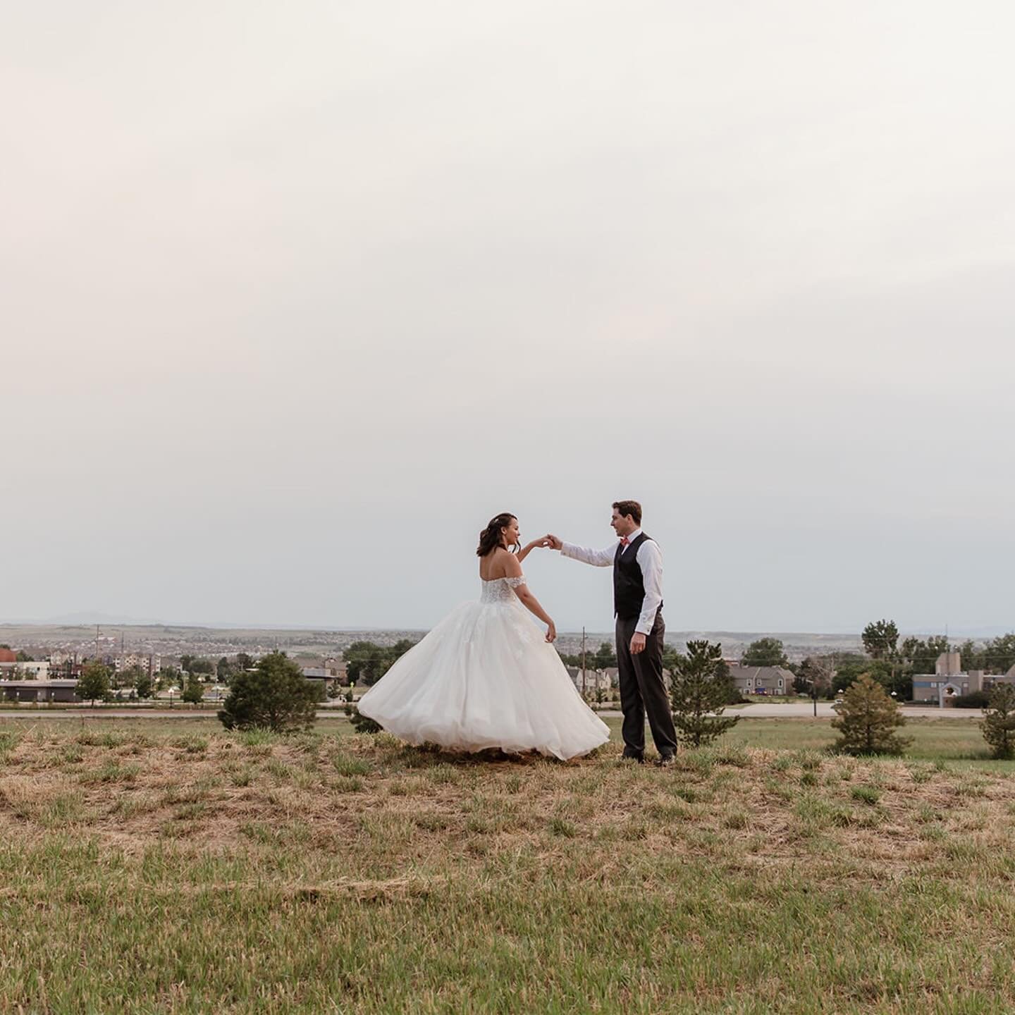 Olivia and Caleb shared a beautiful dance in the middle of an open field, celebrating their love with every step and twirl. It was an honor to capture this moment of pure joy and connection. 

Vendors:
Event planner: Grace &amp; Co
Floral: Mainstreet