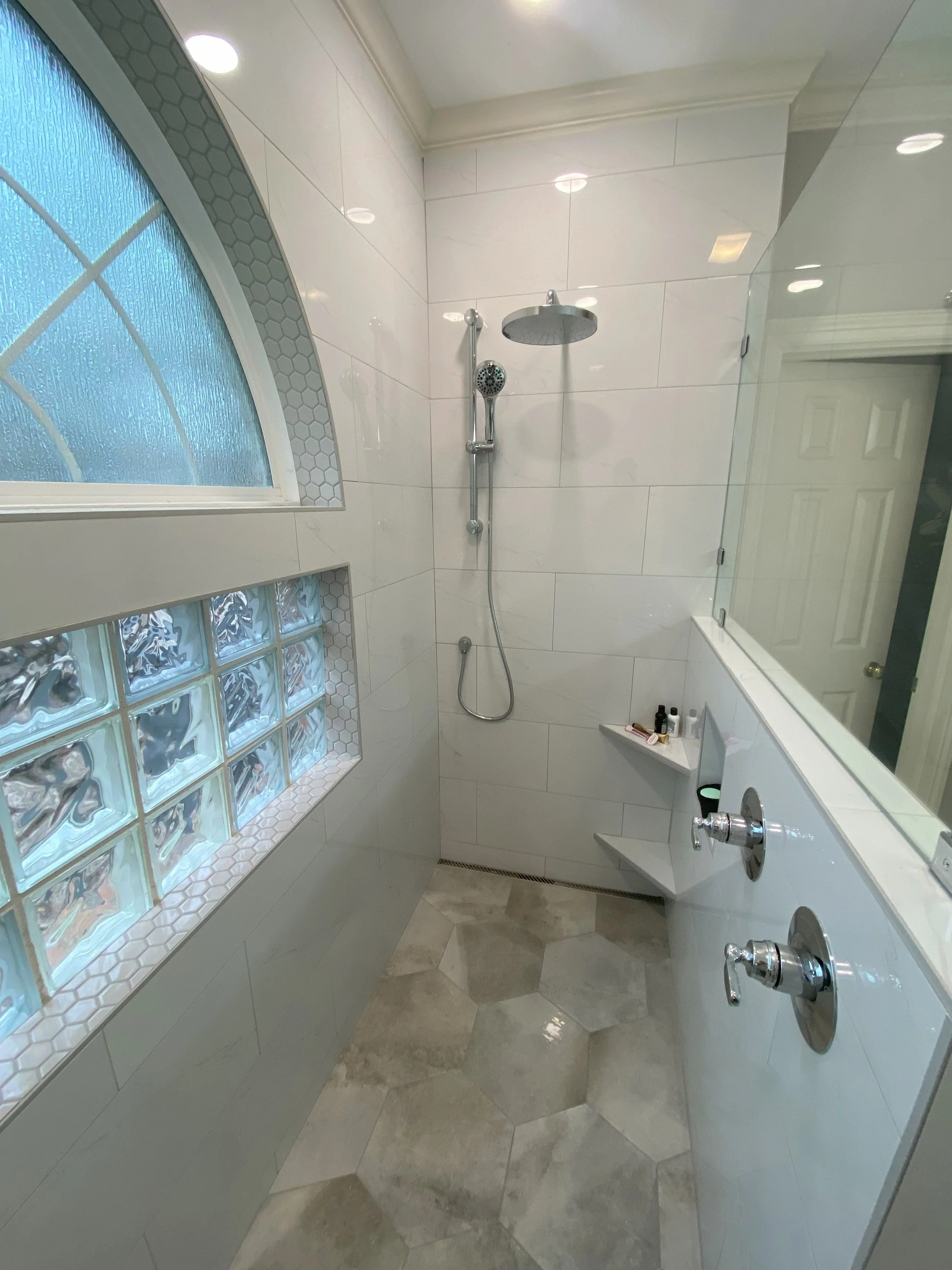 Bryan Emerald Forest JAN Master Bathroom remodel with linear drain, gray hexagon tile, custom window work 2.jpg