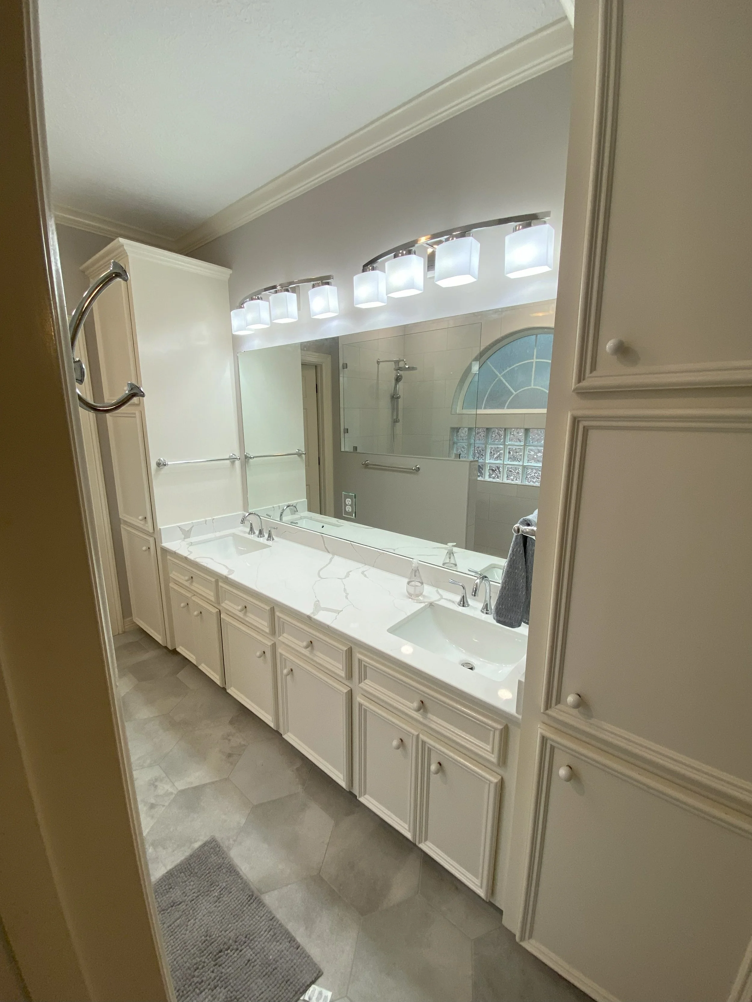Bryan Emerald Forest JAN Master Bathroom remodel with new cabinets, gray veining quartz countertop, gray hexagon tile, new mirrors 2.jpg