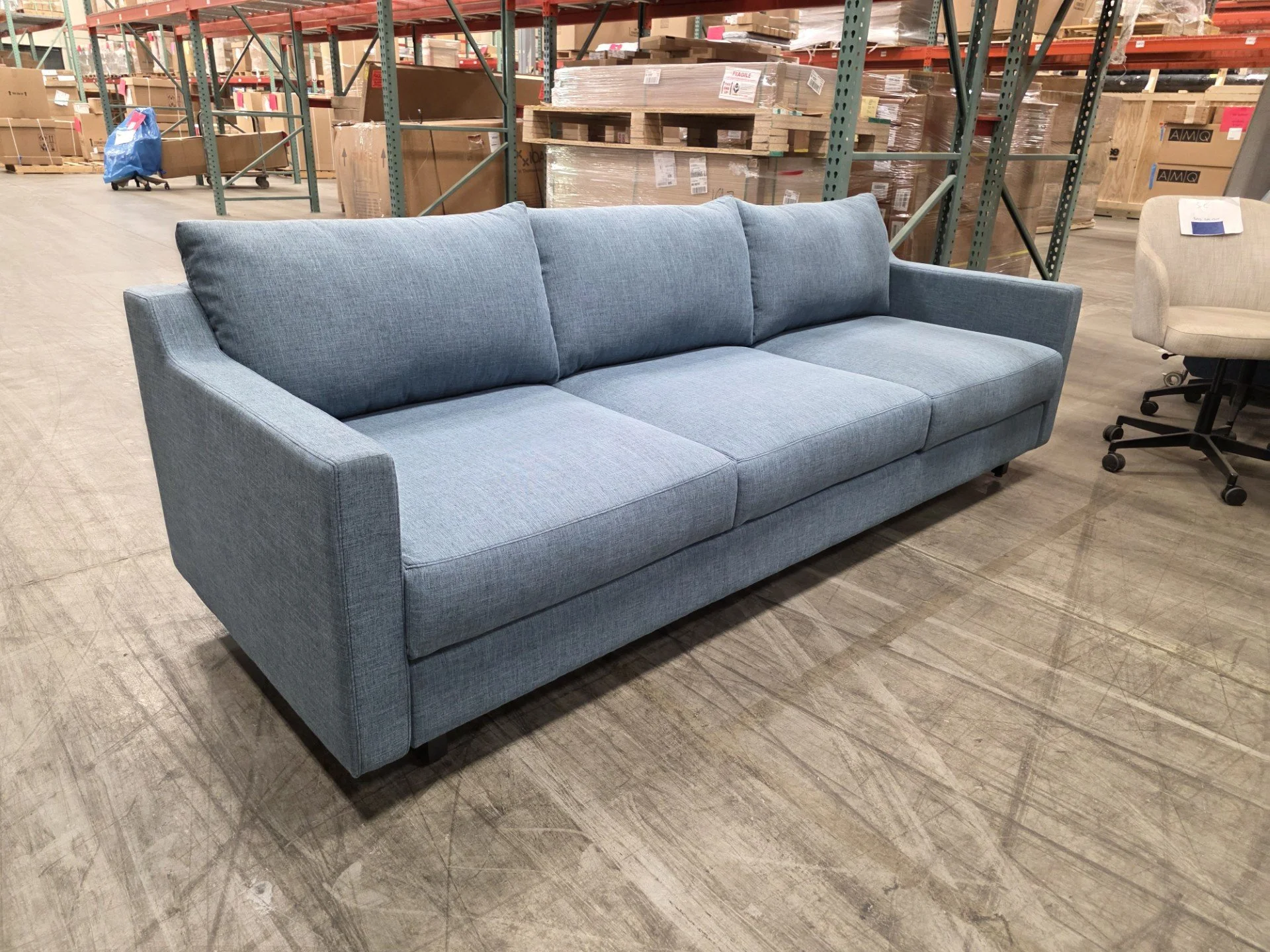 Kimball – Collette Sofa
 96”W x 36”D x 35”H  Sections: 64"W x 32"D x 29"H Dusty blue fabric Qty: 1 | $1,495 ($3,370 New)