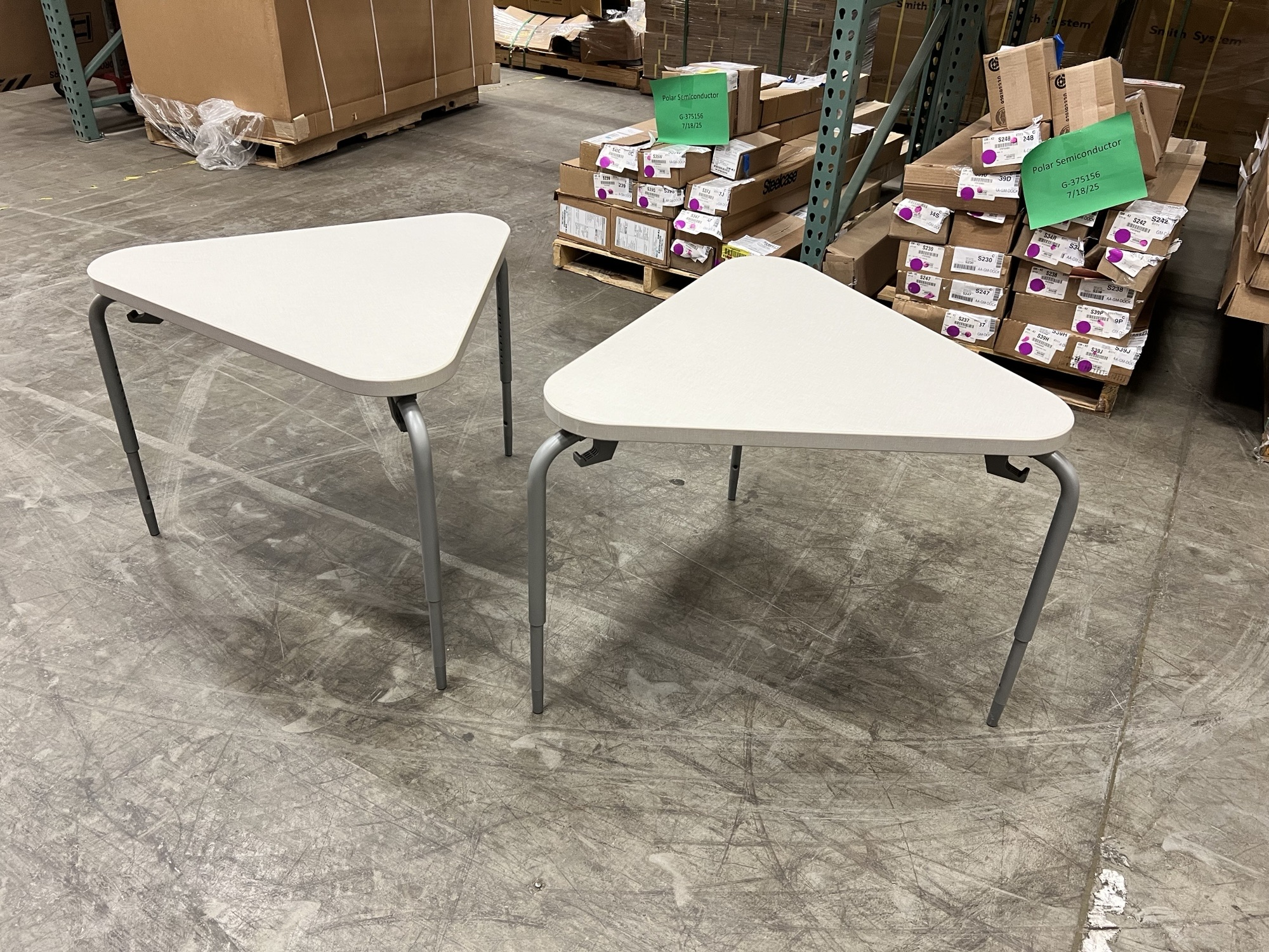 Smith System - Triangle Table 28"D x 32"W x 24.5"-30"H Light grey laminate, Silver legs, Casters Qty: 2 | $100 Each