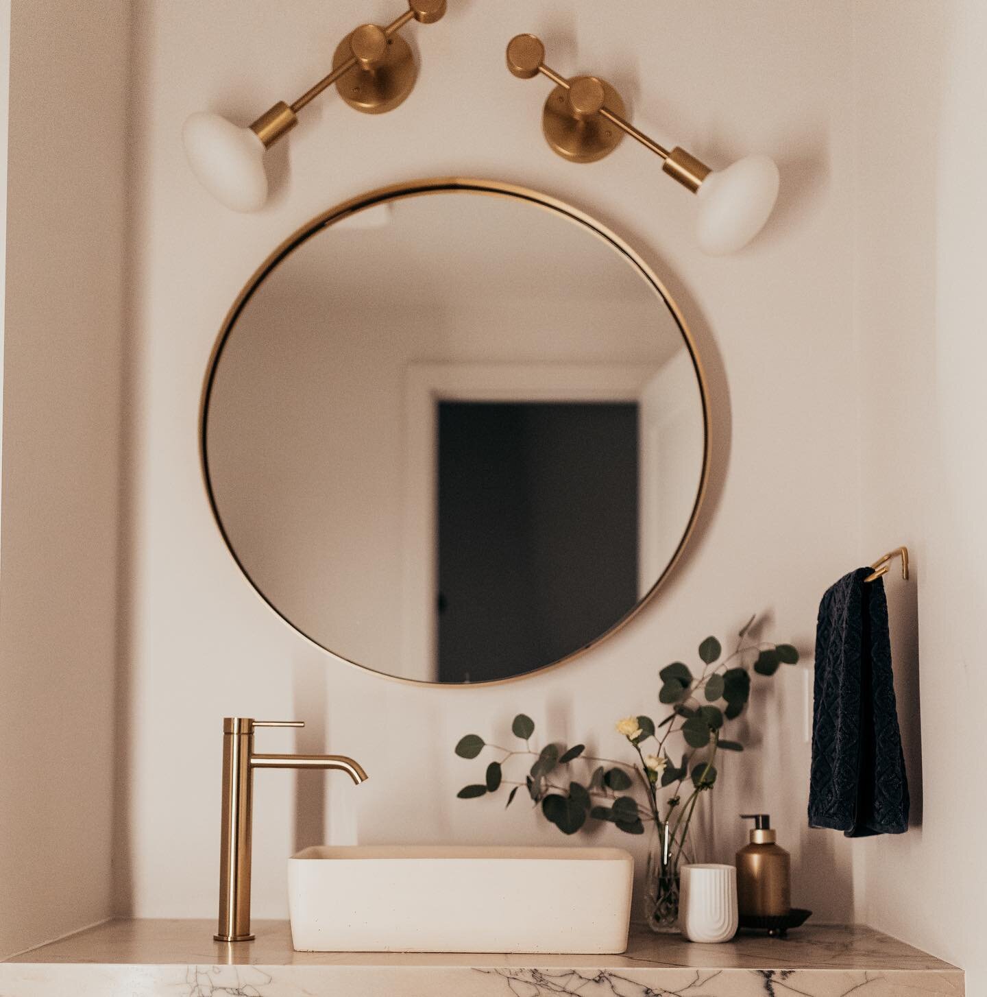 All the right details in this petite powder room.