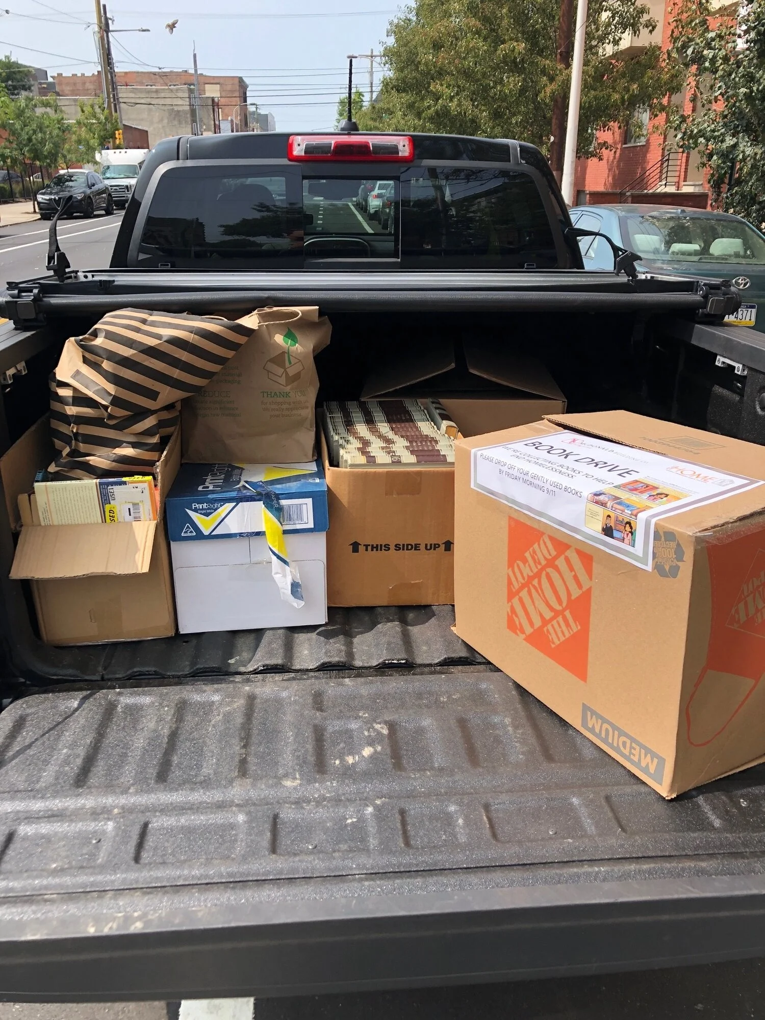 McDonald Building Company Donates Truck Loads of Books for Project HOME Book Drive