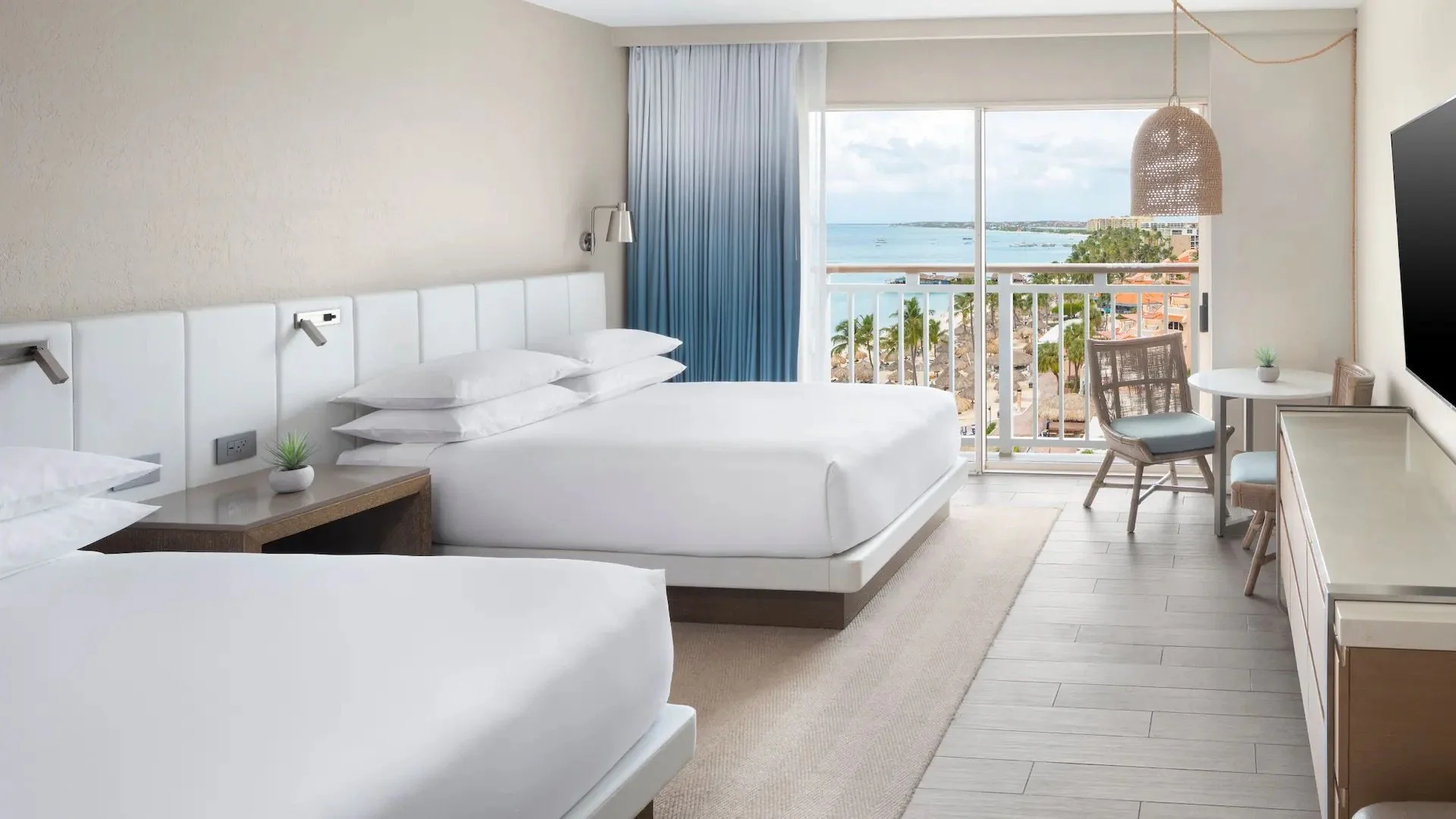 ARUBA-P0754-Two-Queen-Beds-Guestroom-Ocean-View.16x9.jpeg