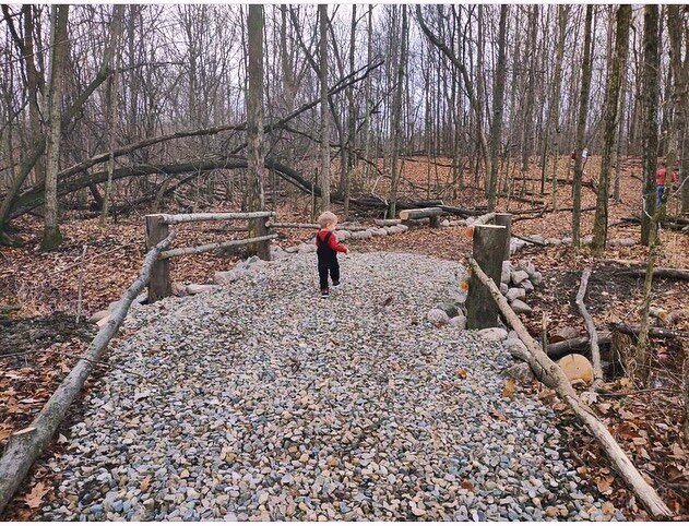 Over the river and through the woods! 🍂  Did you know Dupont Meadows offers a walking trail complete with a warming fire pit and log seating big enough for the whole family?🔥