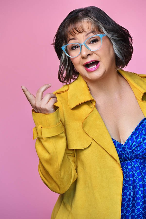 comedic-actress-headshot-yellow-coat-los-angeles.jpg