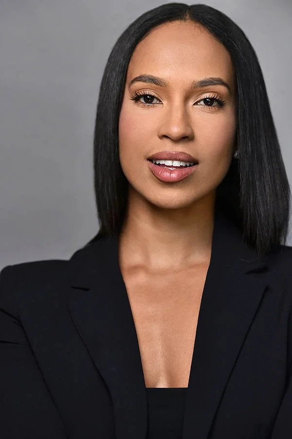 Theatrical actor headshot of a woman with straight black hair wearing a structured black blazer. Film and television casting portfolio photography in Studio City, Los Angeles.
